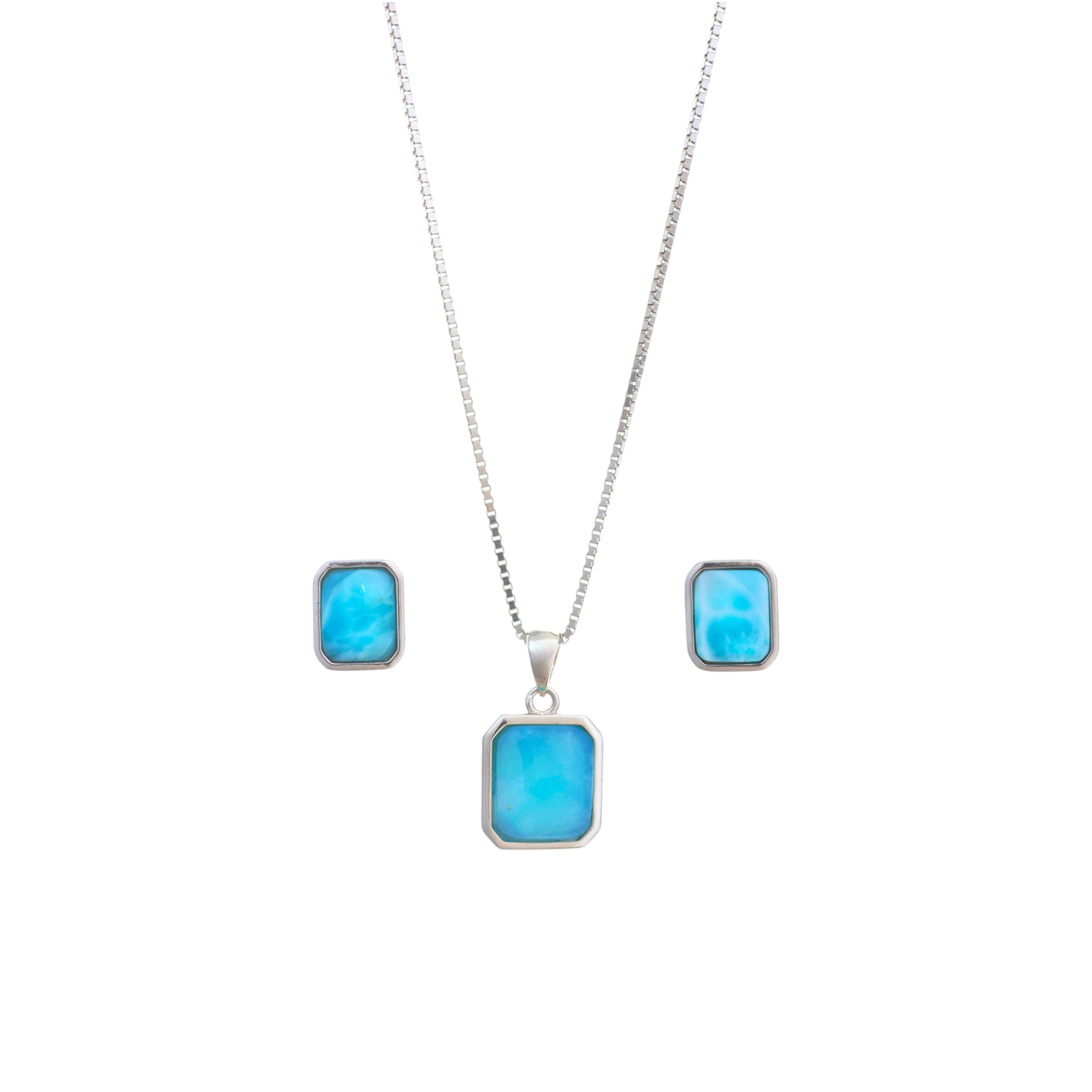 A silver box chain necklace featuring a rectangular ocean-blue Larimar cabochon pendant set in a sleek silver bezel frame.