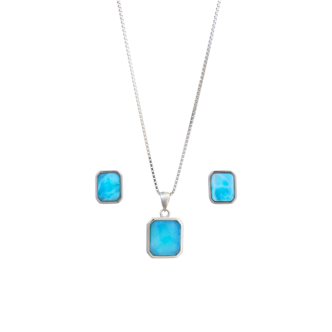 A silver box chain necklace featuring a rectangular ocean-blue Larimar cabochon pendant set in a sleek silver bezel frame.