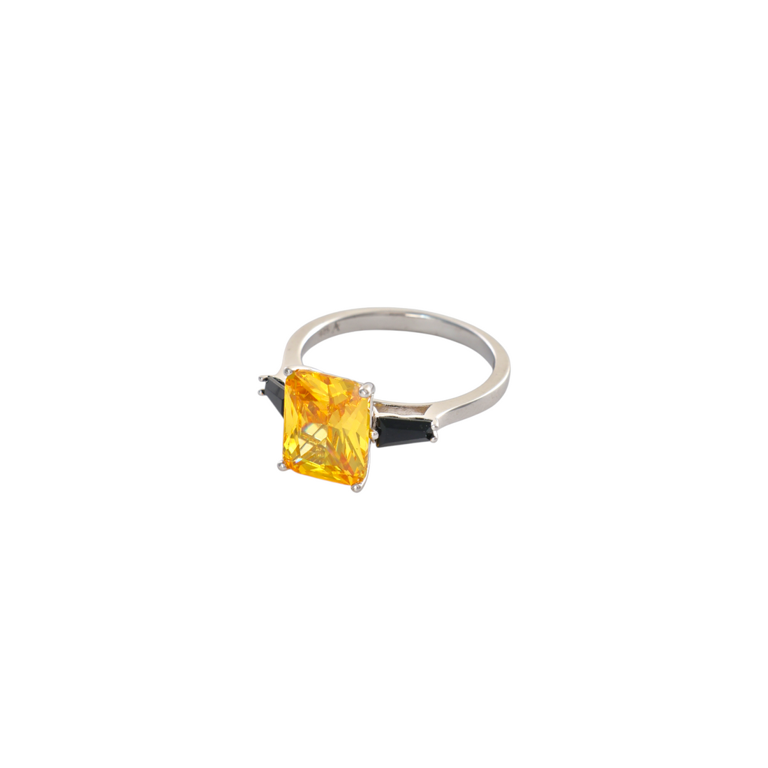 Radiant cut canary yellow stone ring flanked by black baguette gems in sterling silver.