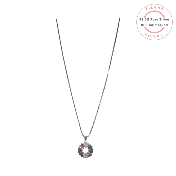 Silona Chromatic Heart Wreath Necklace with a multicolor cubic zirconia heart pendant on a silver box chain, against a white background.