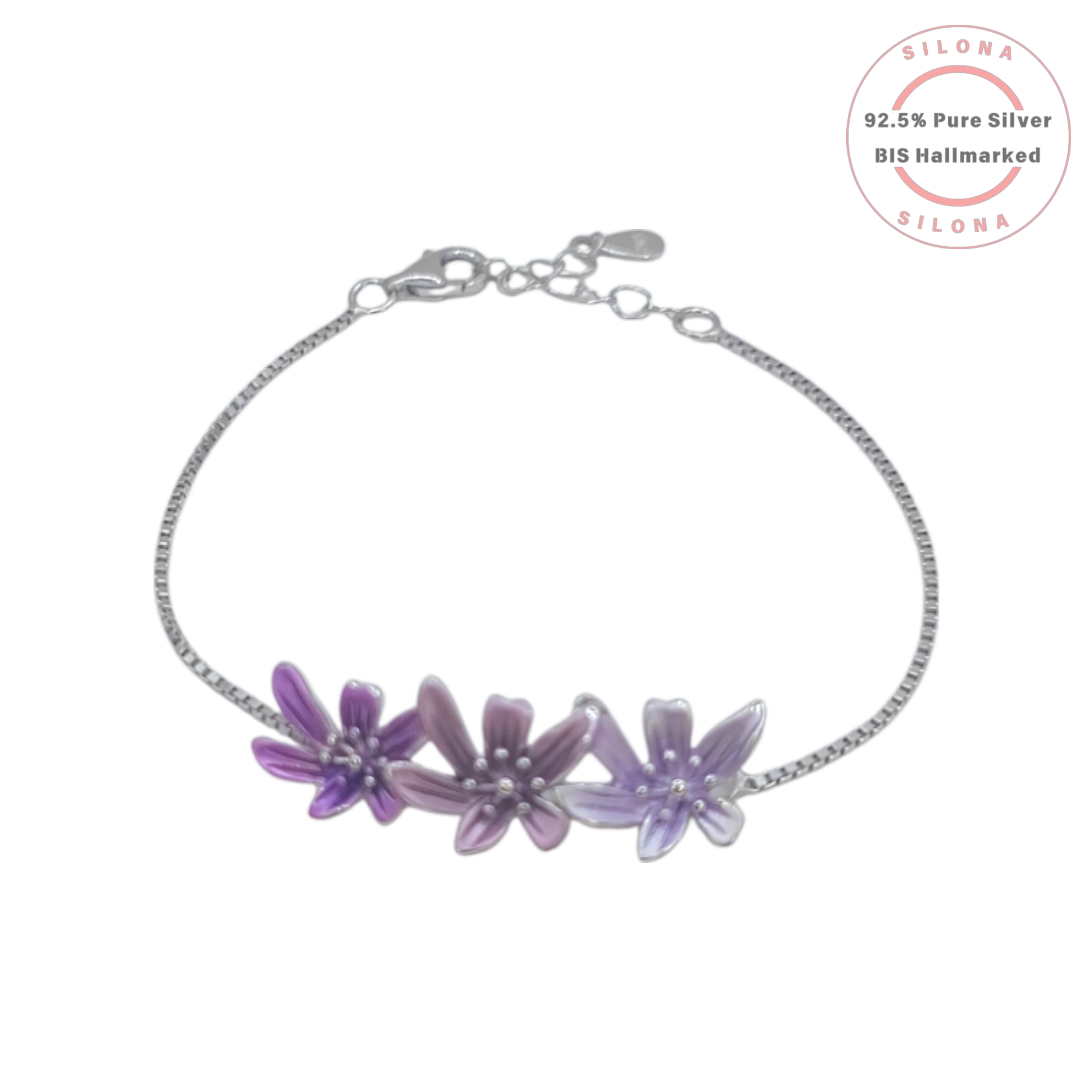A delicate silver box chain bracelet with three enamel flowers in shades of purple and lavender, crafted from 92.5 pure silver by Silona.