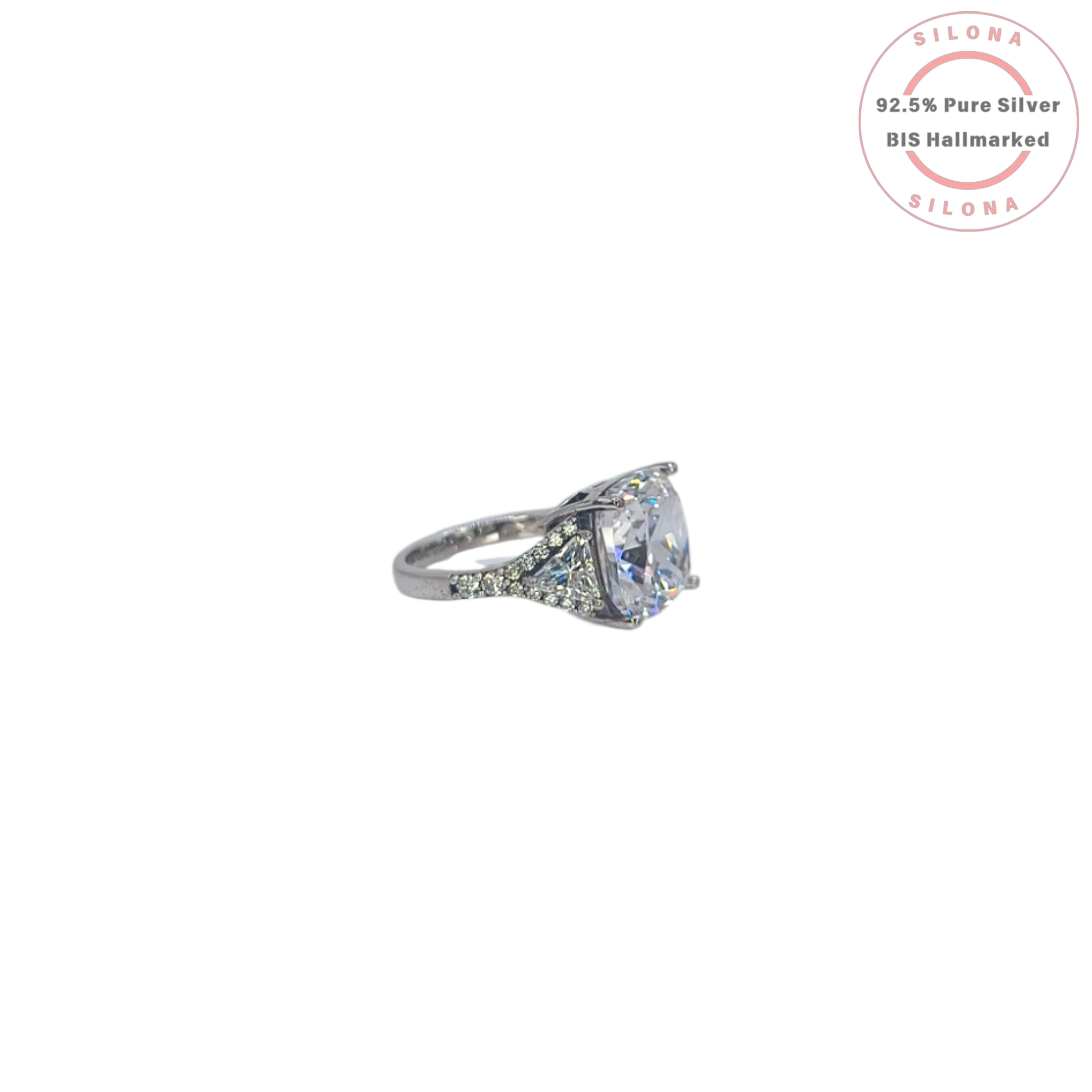 Silona's Classic Cushion Cut Trilogy Ring featuring a large central cubic zirconia stone flanked by two trilliant-cut stones, set in 92.5 hallmarked silver.