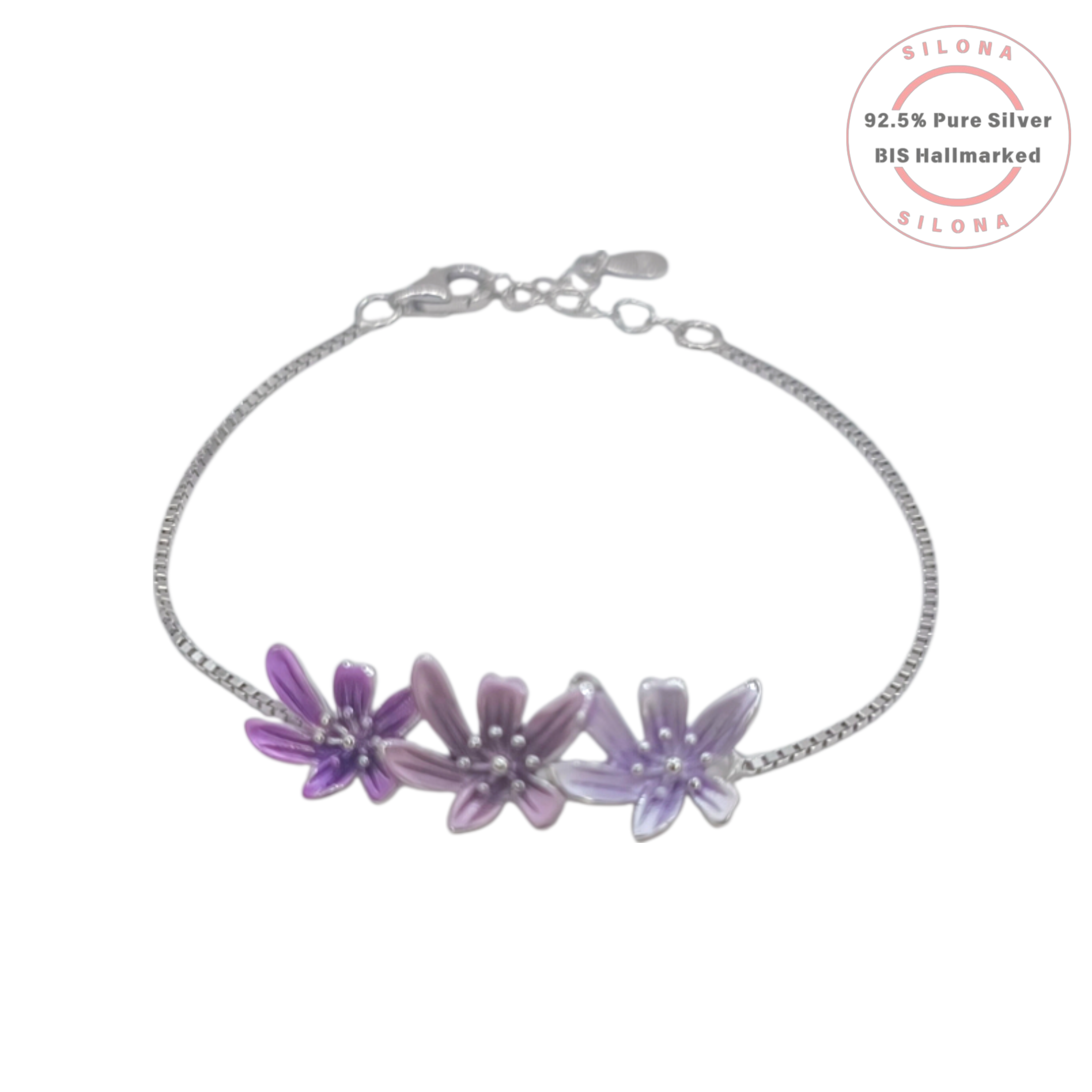 A delicate silver box chain bracelet with three enamel flowers in shades of purple and lavender, crafted from 92.5 pure silver by Silona.