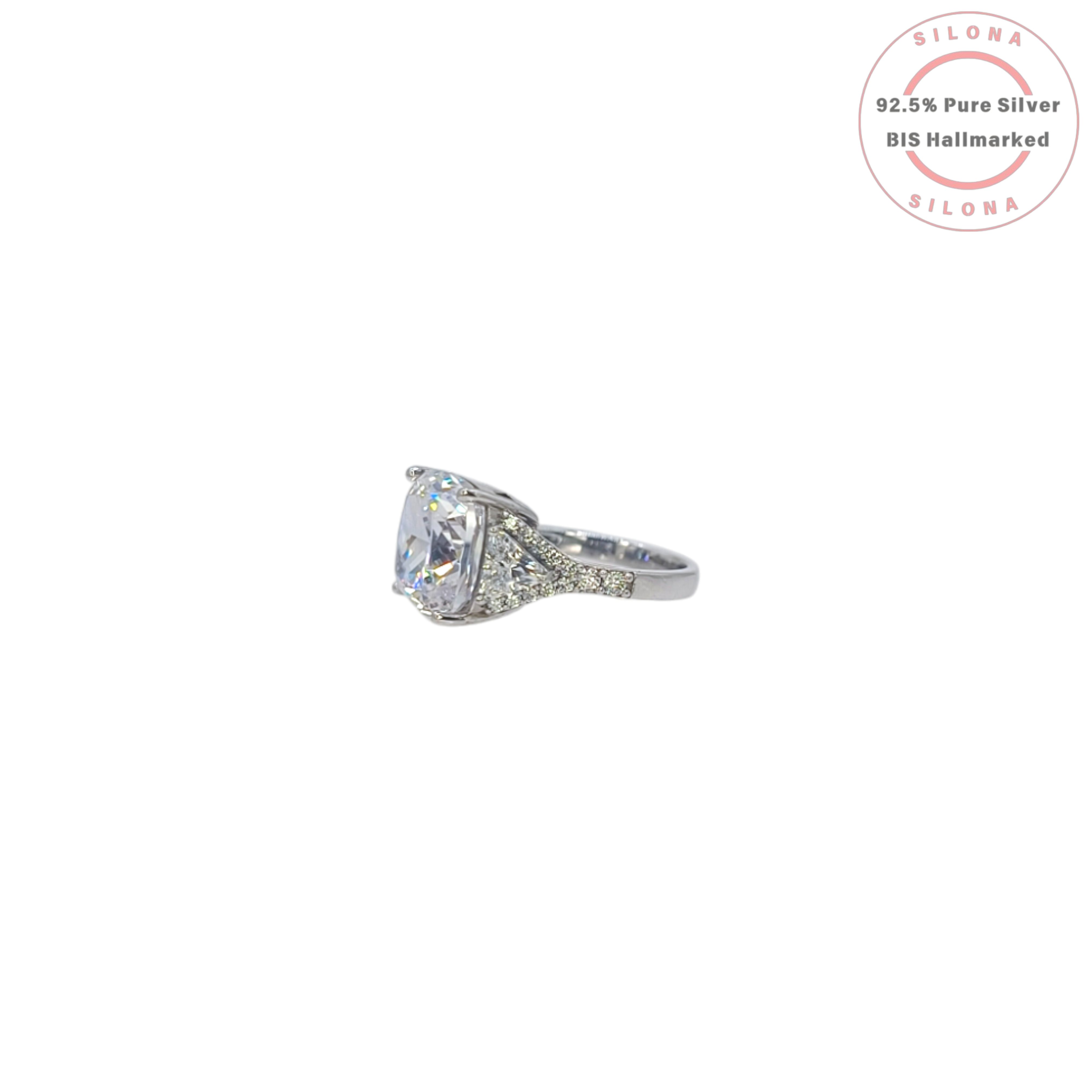 Silona's Classic Cushion Cut Trilogy Ring featuring a large central cubic zirconia stone flanked by two trilliant-cut stones, set in 92.5 hallmarked silver.