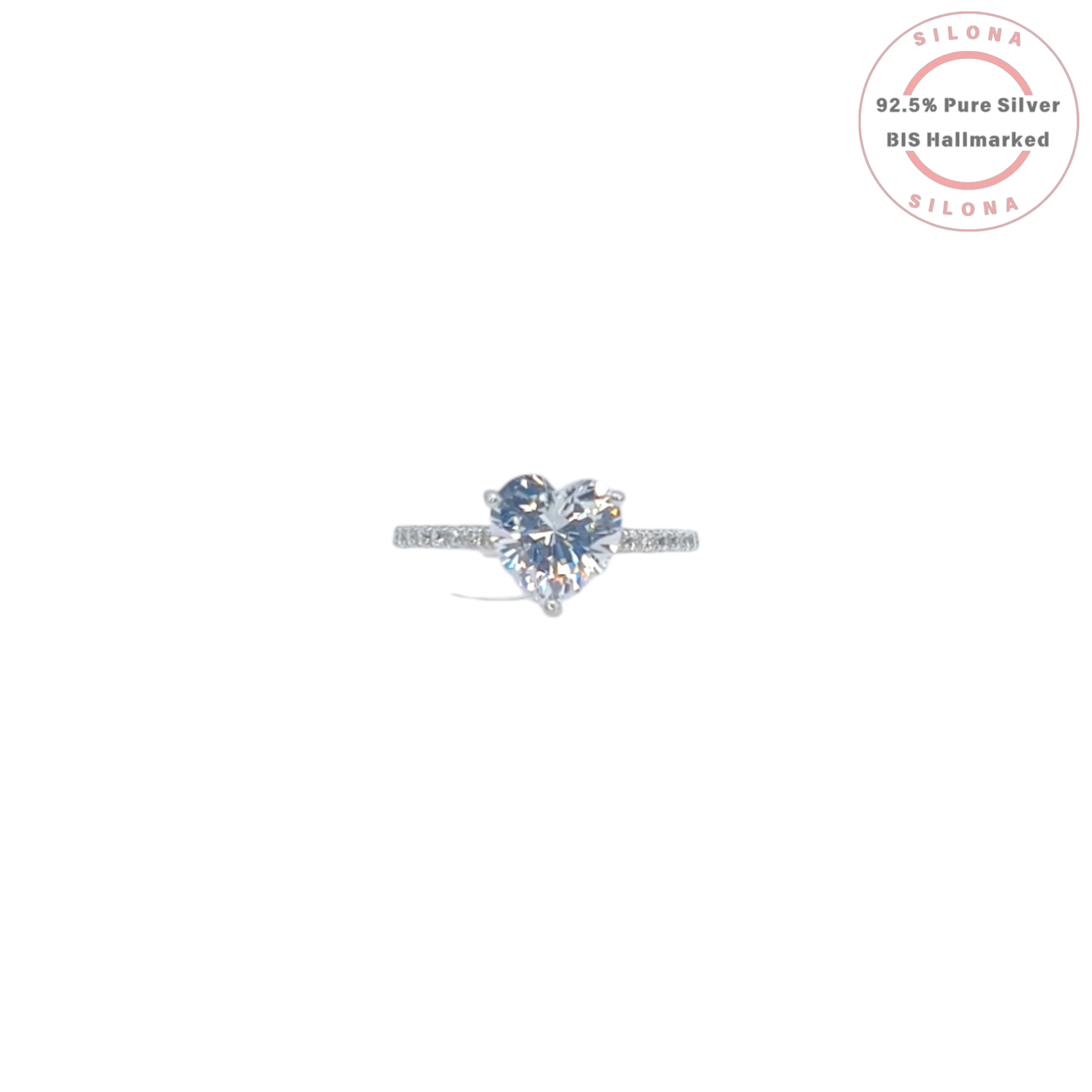 A solitaire heart-cut cubic zirconia ring with a delicate pavé band, crafted in 92.5 sterling silver, photographed on a white background.