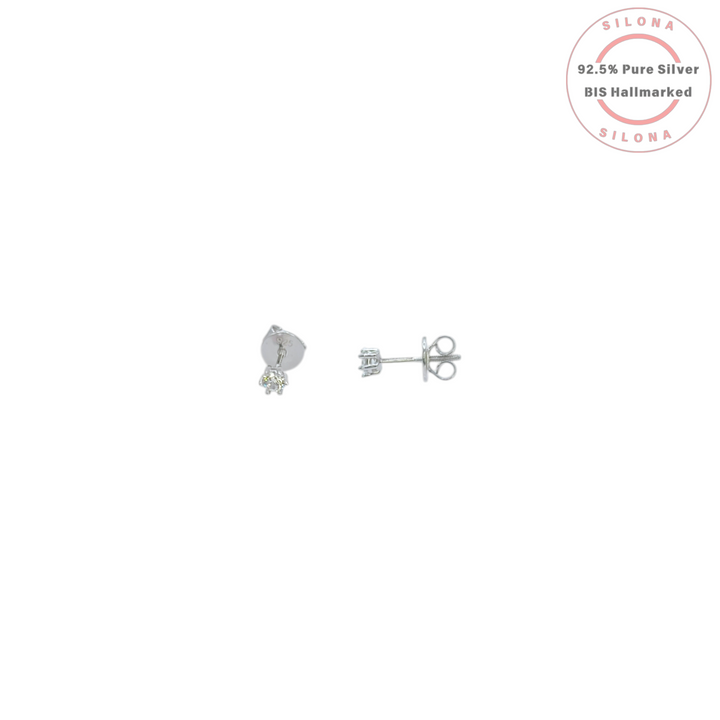 A pair of classic solitaire stud earrings in 92.5 silver with a brilliant-cut cubic zirconia stone, shown with a secure screw-back.