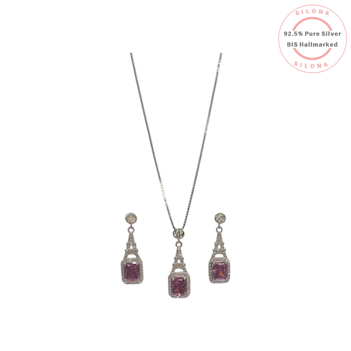 Silona Eiffel Tower necklace and earring set in 92.5 sterling silver, featuring a rose-pink rectangular cubic zirconia and pavé detailing.