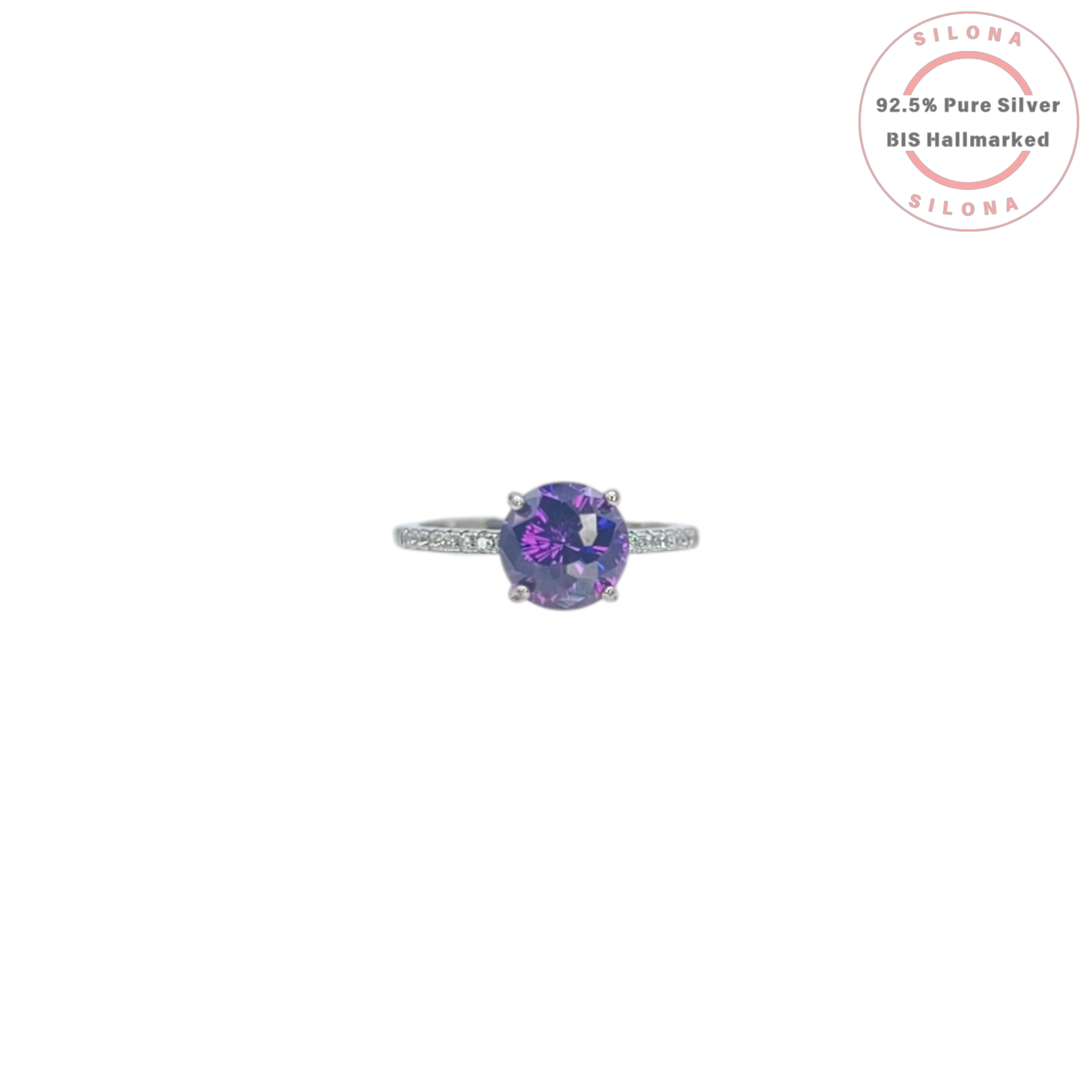 A classic solitaire ring crafted in 92.5 silver, featuring a large, round, deep purple center stone with pavé-set cubic zirconia on the band, shown on a white background.