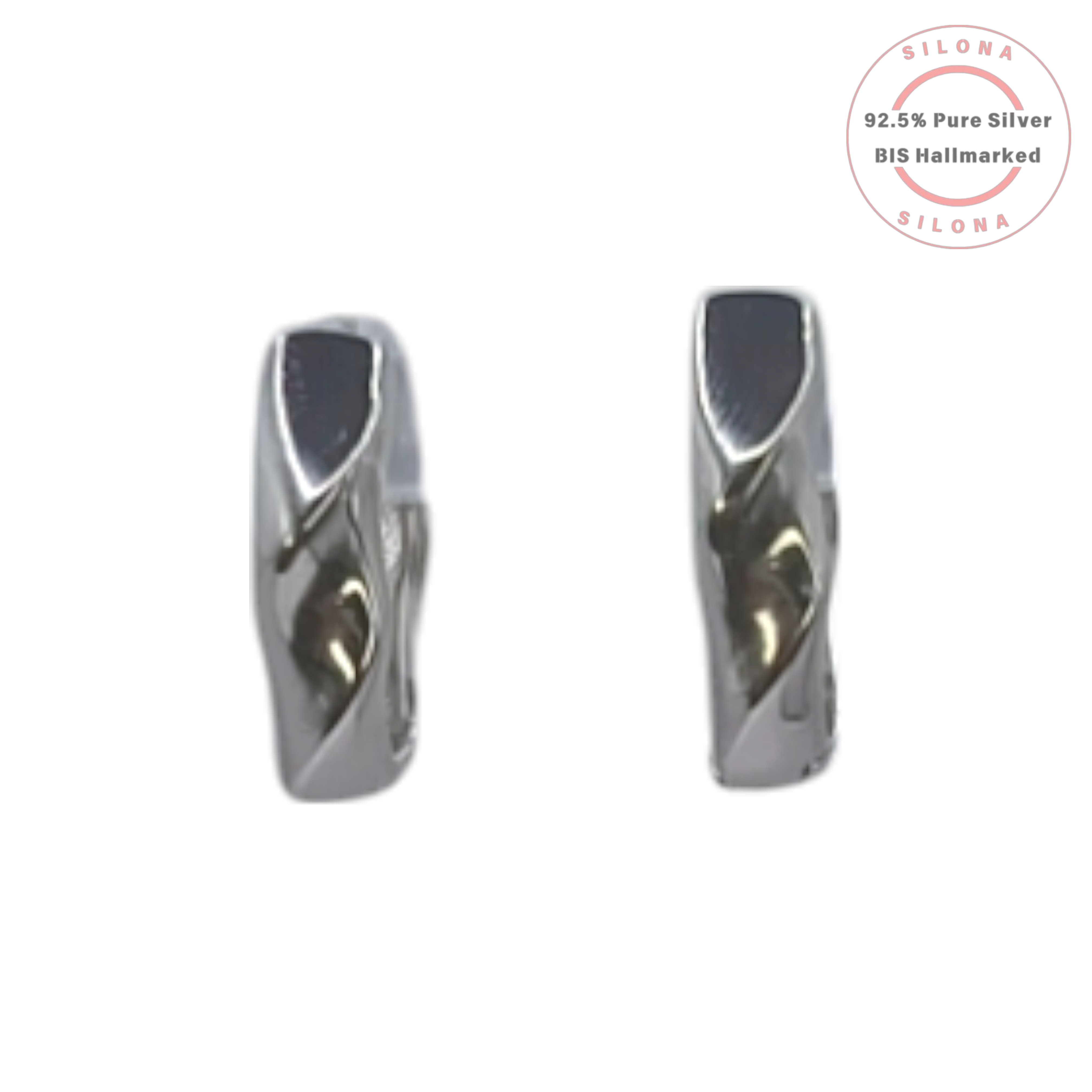 A pair of modern sculptural silver huggie earrings with a subtle twist design on a clean white background.