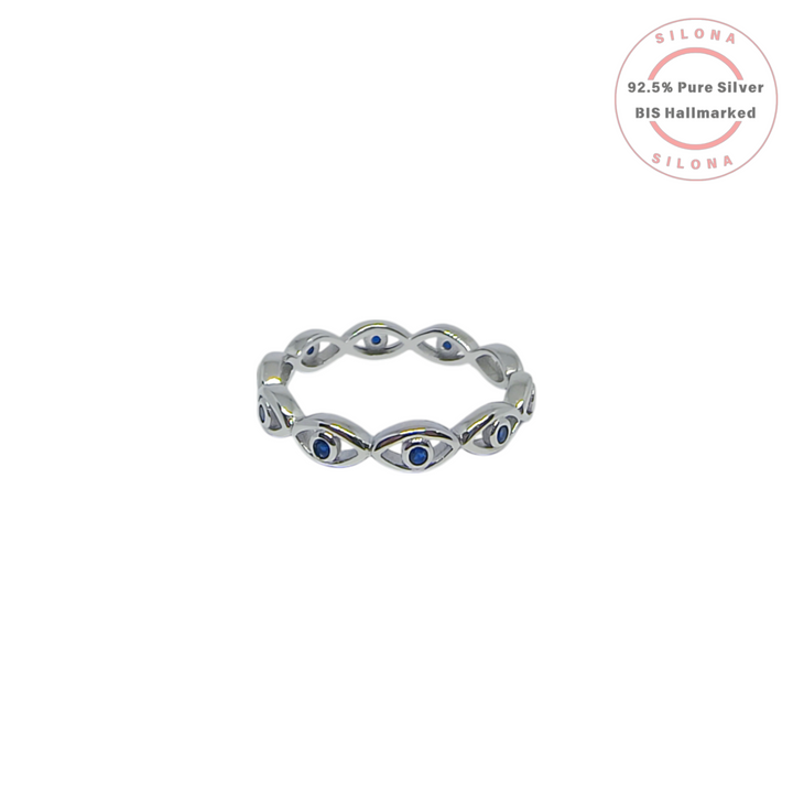 Silona Chic Evil Eye Eternity Ring in 92.5 silver with sapphire-blue stones on a white background.