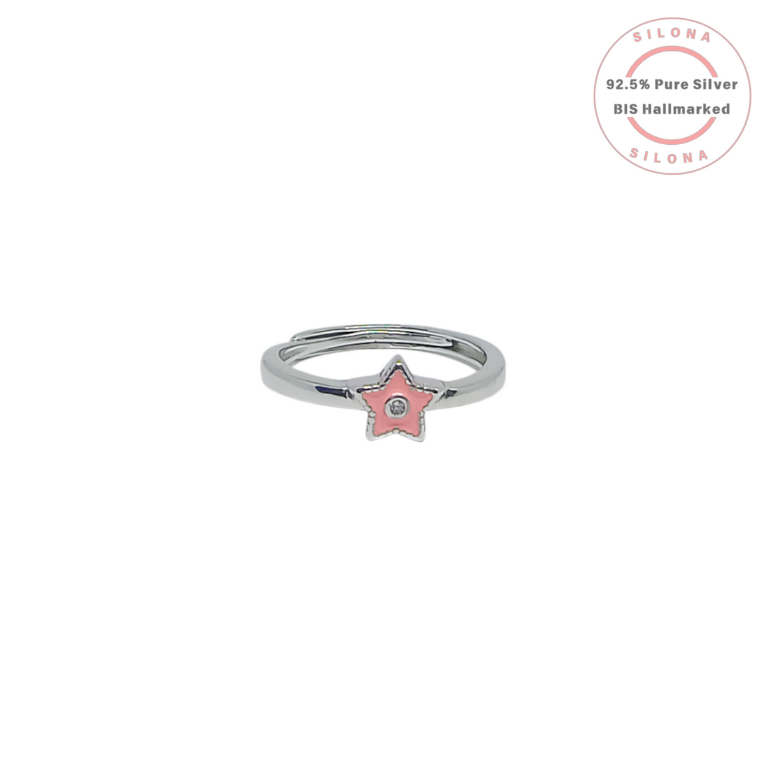 Silona's adjustable silver ring featuring a pink enamel star with a central cubic zirconia, on a white background.
