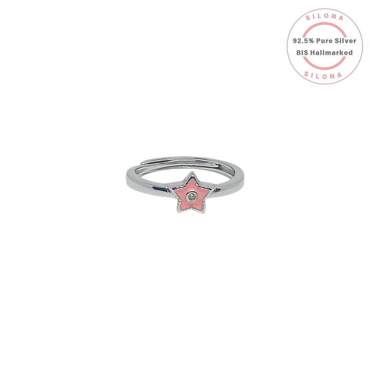 Silona's adjustable silver ring featuring a pink enamel star with a central cubic zirconia, on a white background.