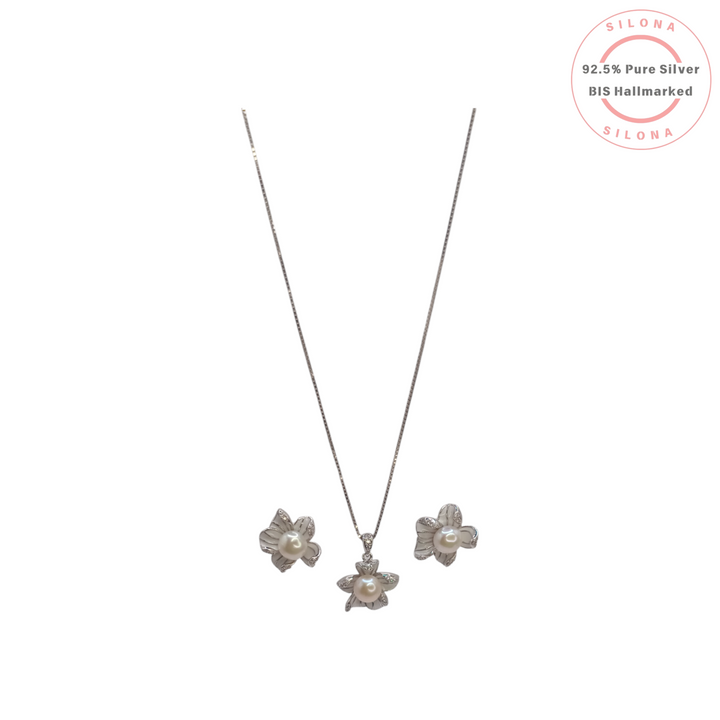 Silona Elegant Pearl Flower Necklace and Earring Set in 92.5 silver. The set features a pendant and stud earrings in a floral design with a central pearl, displayed on a white background.
