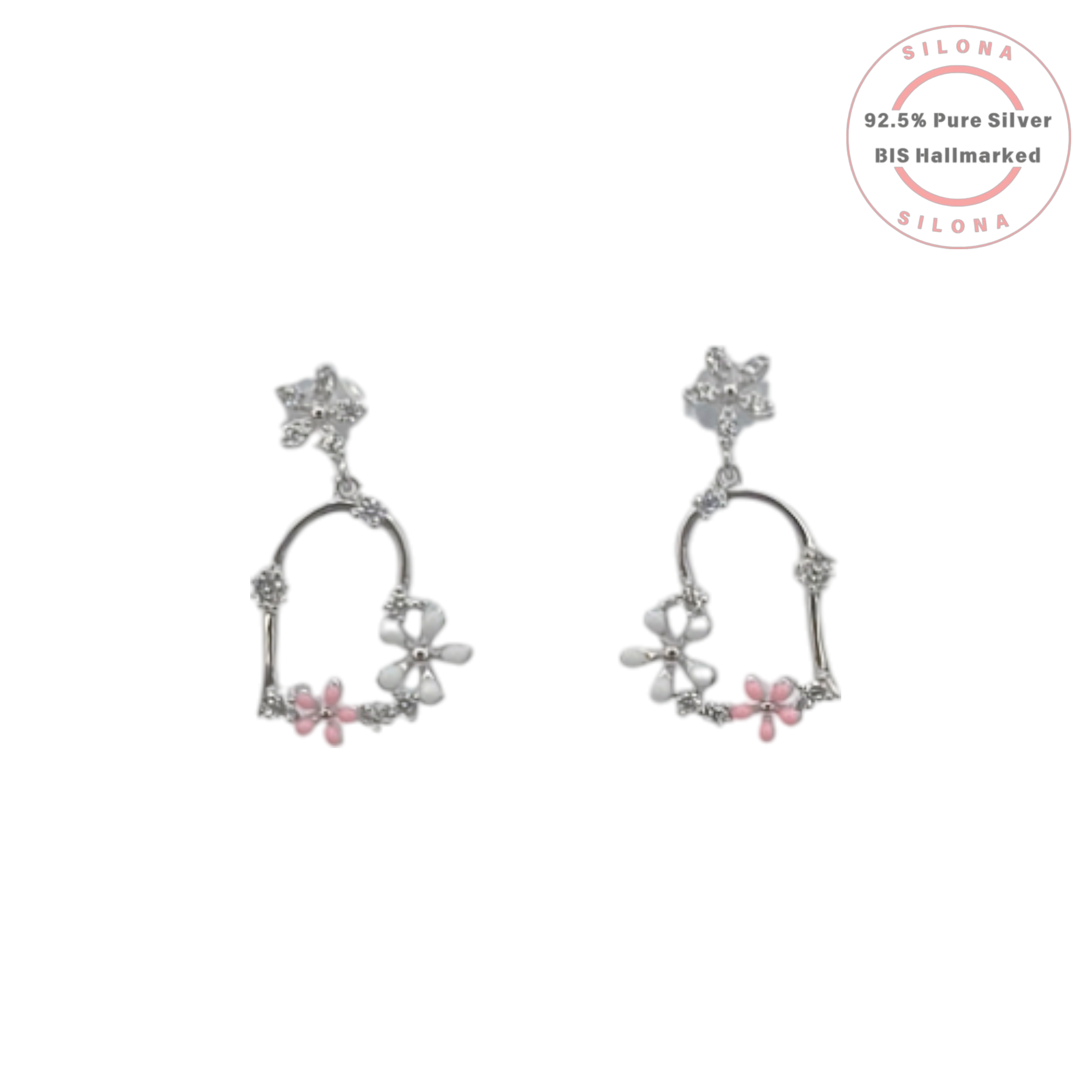 A pair of Silona's Floral Swing Drop Earrings in 92.5 silver, featuring pink and white enamel flowers on a sparkling arch.