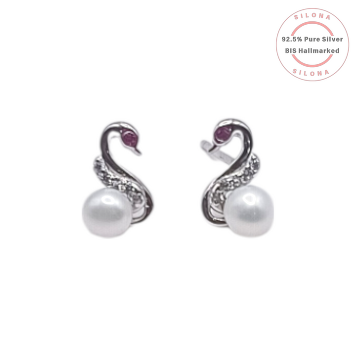 A pair of elegant swan-shaped stud earrings in 92.5 silver, featuring a white pearl and paved cubic zirconia.
