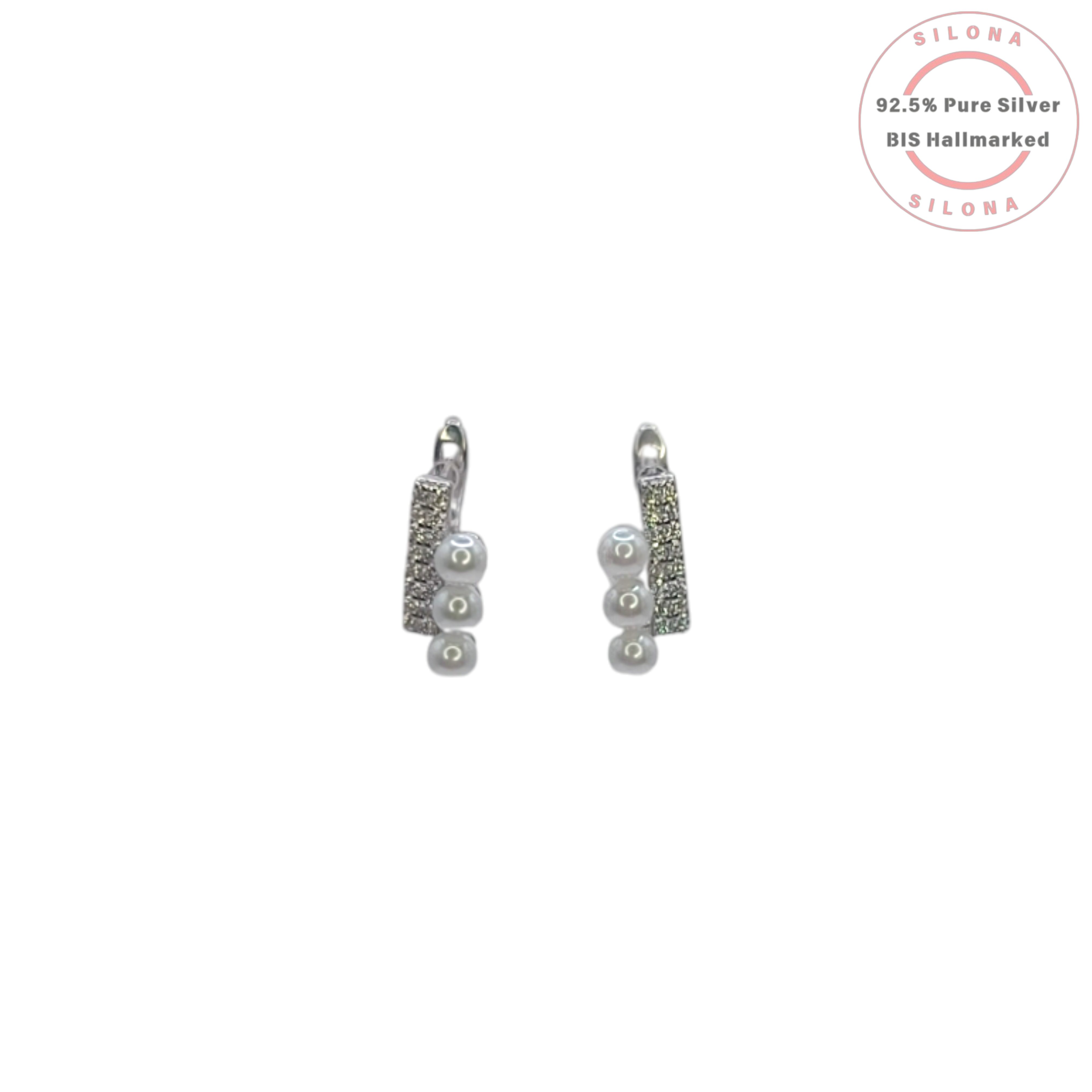 A pair of Modern Pearl Trio Huggie Earrings in 92.5 silver, featuring a pavé cubic zirconia bar and a cascade of three white pearls, on a white background.