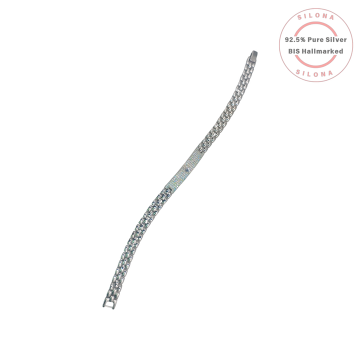 Sleek double-row silver link bracelet with a central rectangular bar fully encrusted with pavé-set cubic zirconia, on a white background.