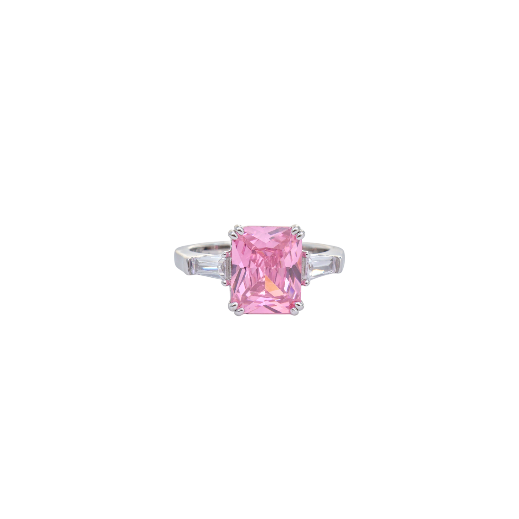 Radiant cut pink gemstone ring with clear baguette side stones in polished silver.