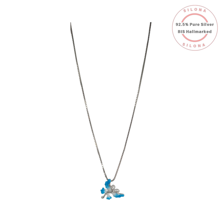 Silona's Ethereal Butterfly Necklace with blue and white enamel pendant on a silver box chain, crafted from 92.5 silver.