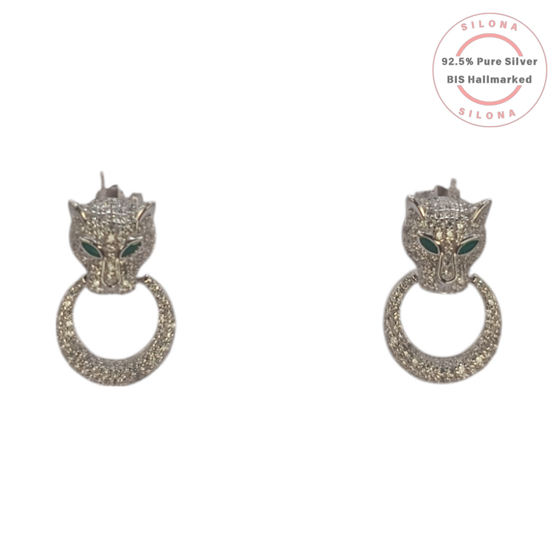 A pair of Silona's Fierce Panther silver earrings, featuring pave cubic zirconia and green stone eyes, on a white background.