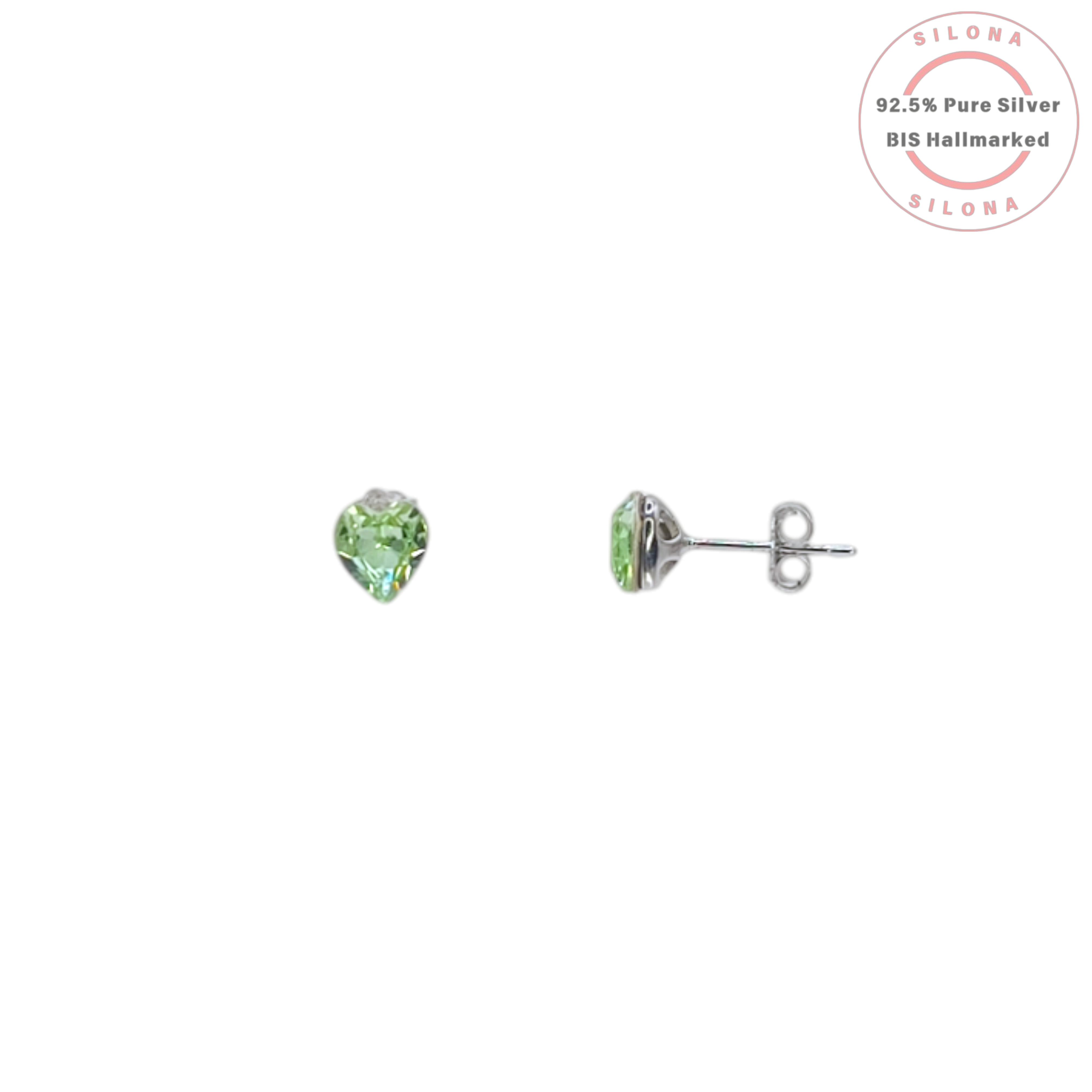 Pair of Silona silver stud earrings with faceted, peridot green, heart-shaped crystals on a white background.