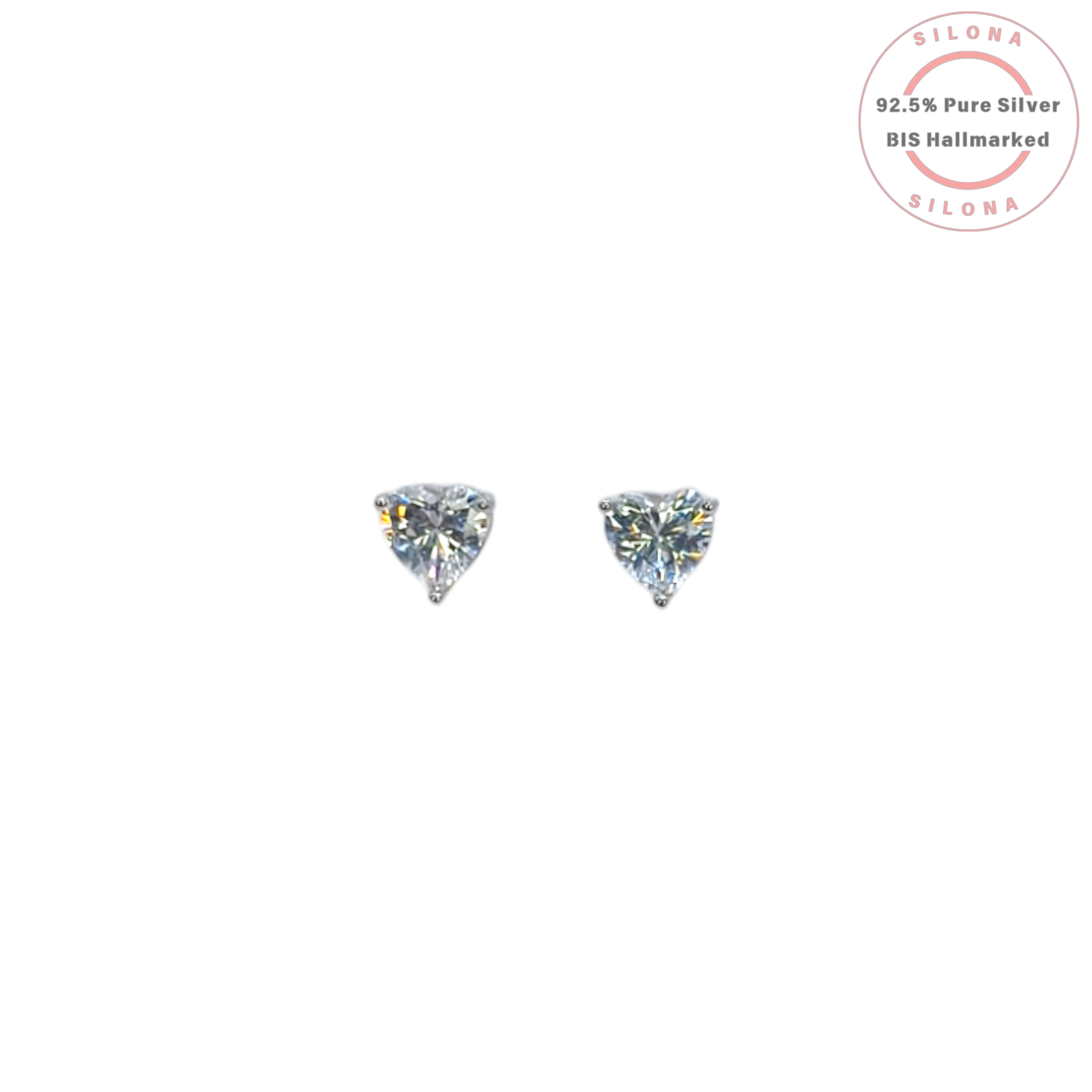 A pair of Silona solitaire heart-shaped stud earrings, featuring brilliant-cut cubic zirconia stones set in 92.5 pure silver, on a clean white background.