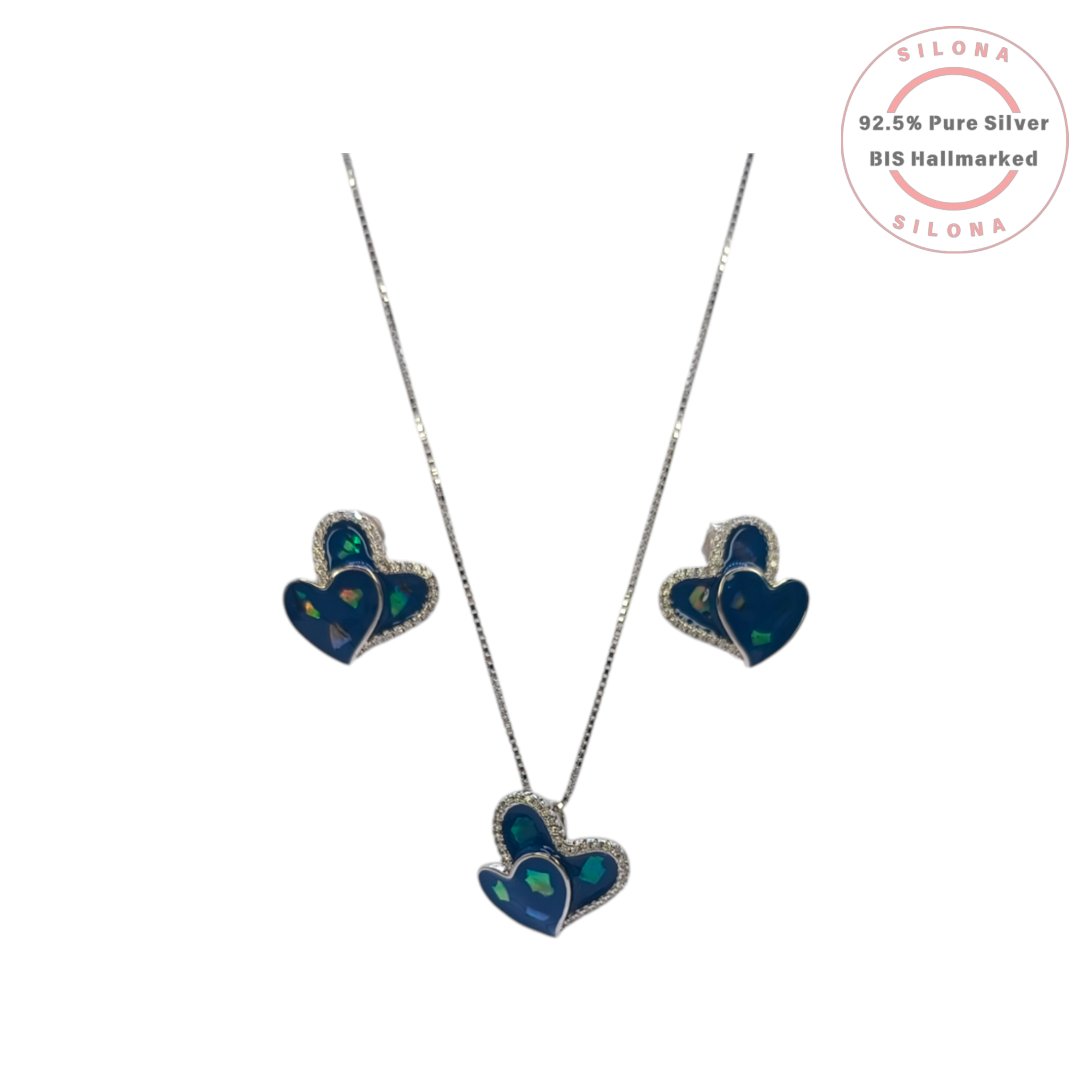 Close-up of the Opaline Double Heart Stud Earrings, part of a set, crafted in 92.5 sterling silver with blue inlay and pavé cubic zirconia.