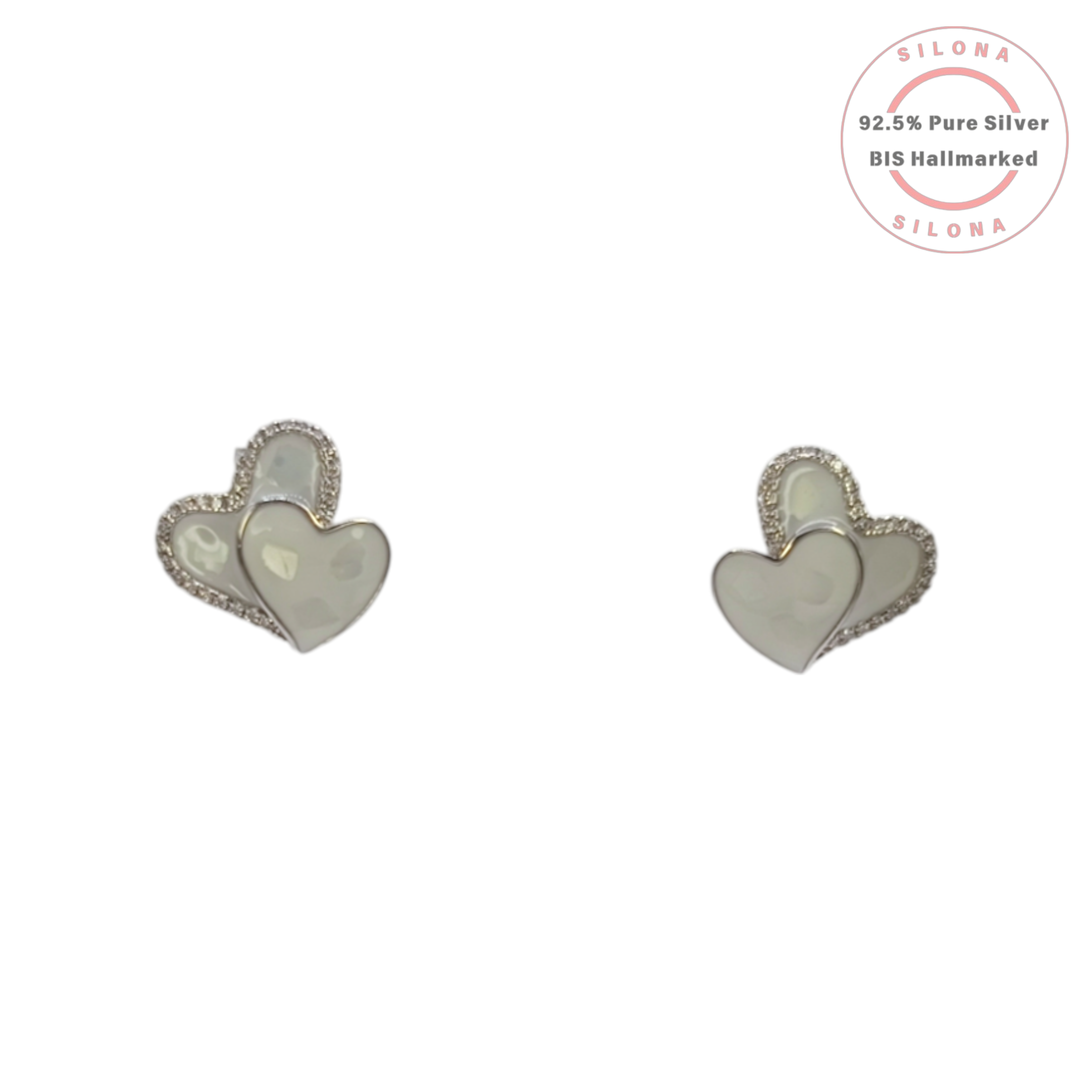 Close-up of the Double Heart stud earrings, part of a set, featuring one Mother of Pearl heart and one pave cubic zirconia heart, crafted in 92.5 silver.