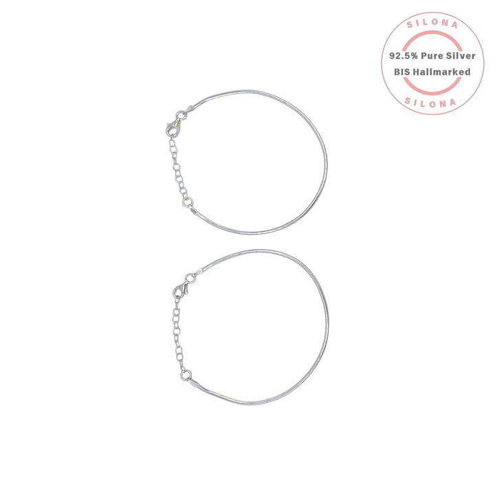 A pair of Silona's sleek snake chain bracelets in 92.5 pure silver, shown on a white background with an adjustable clasp.