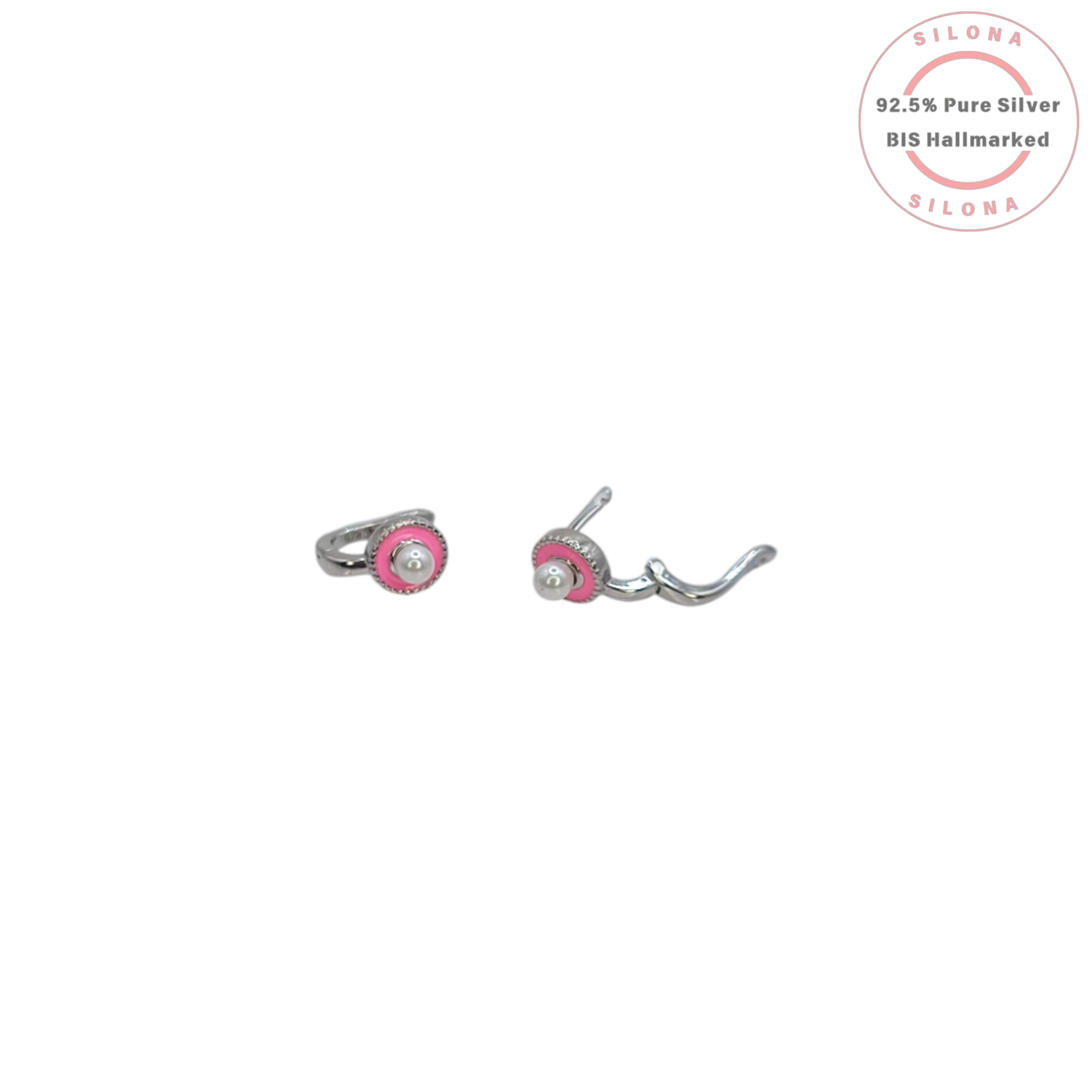Pair of Silona silver huggie earrings with a round pink enamel halo and a central pearl, on a white background.