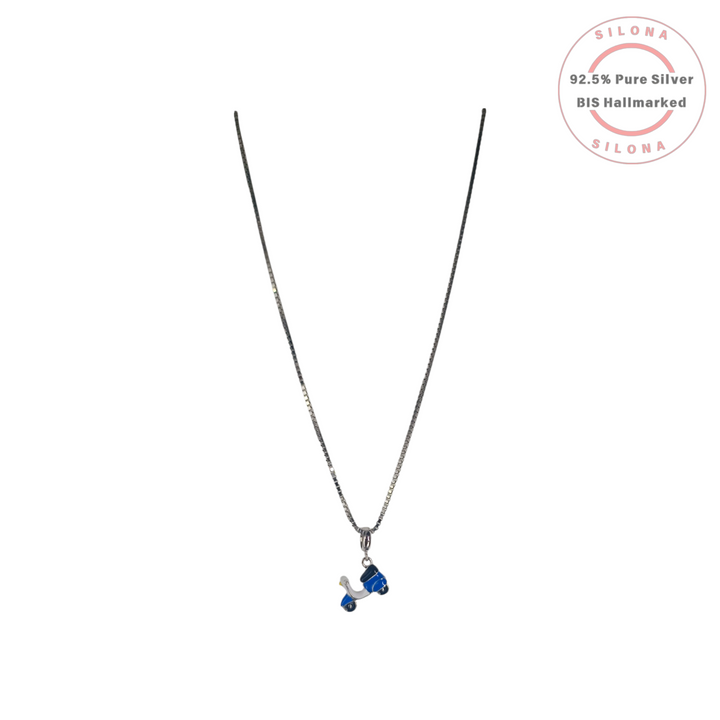 A 92.5 silver box chain necklace with a small, whimsical blue enamel scooter pendant, on a white background with the Silona hallmark.