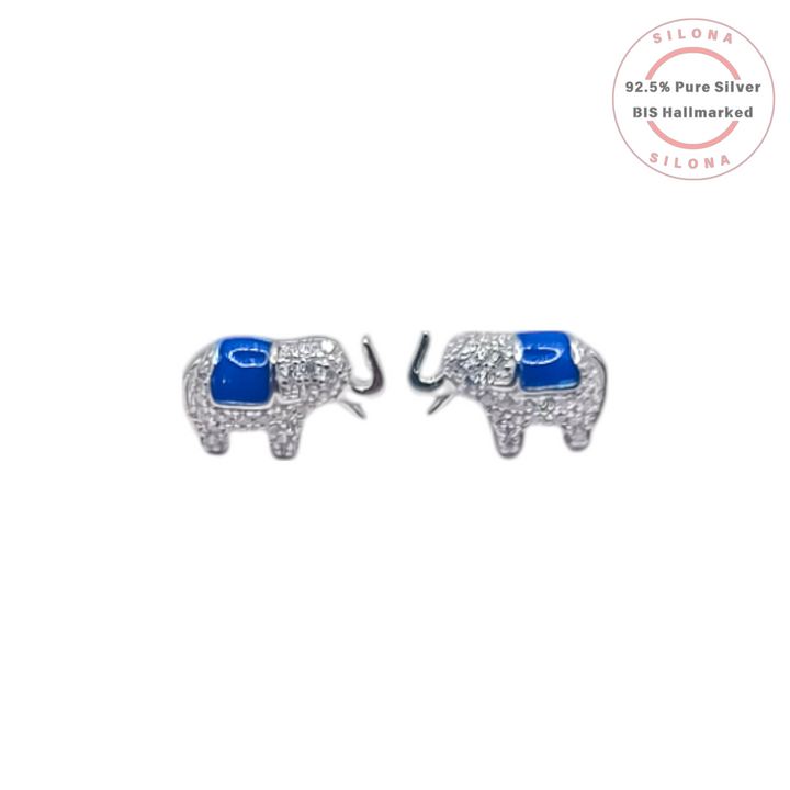 A pair of Silona elephant stud earrings in 92.5 silver, featuring pave-set cubic zirconia and a royal blue enamel saddle, on a white background.