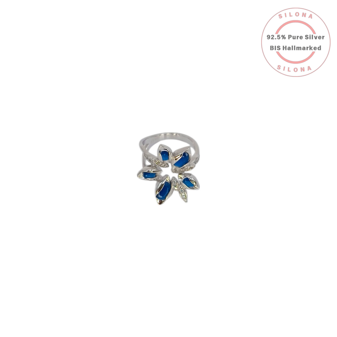 A modern floral statement ring in 92.5 silver, featuring marquise-cut sapphire-blue stones and pavé cubic zirconia, on a white background.