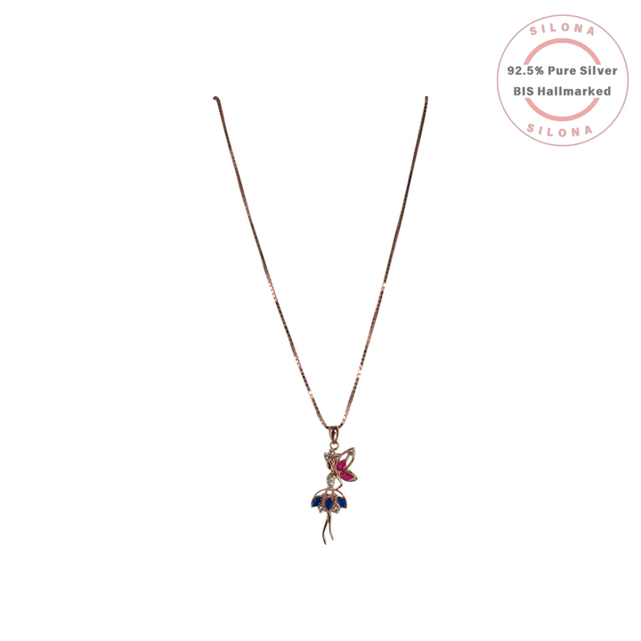 Silona's Rose Gold Ballerina Dancer Necklace featuring a pendant with fuchsia and sapphire-blue stones on a 92.5 silver box chain.