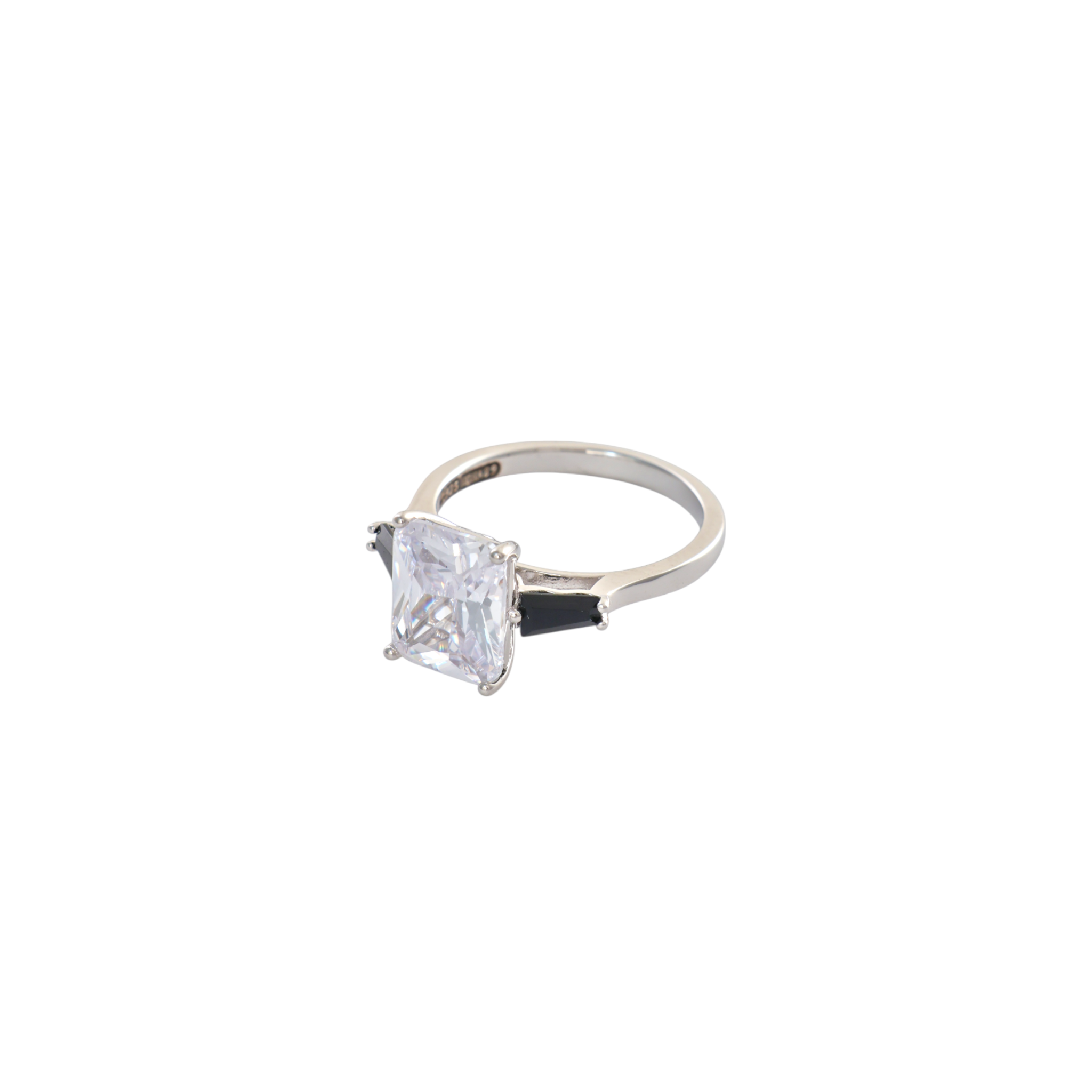 Clear radiant cut central gem flanked by black baguette accent stones set in sterling silver.