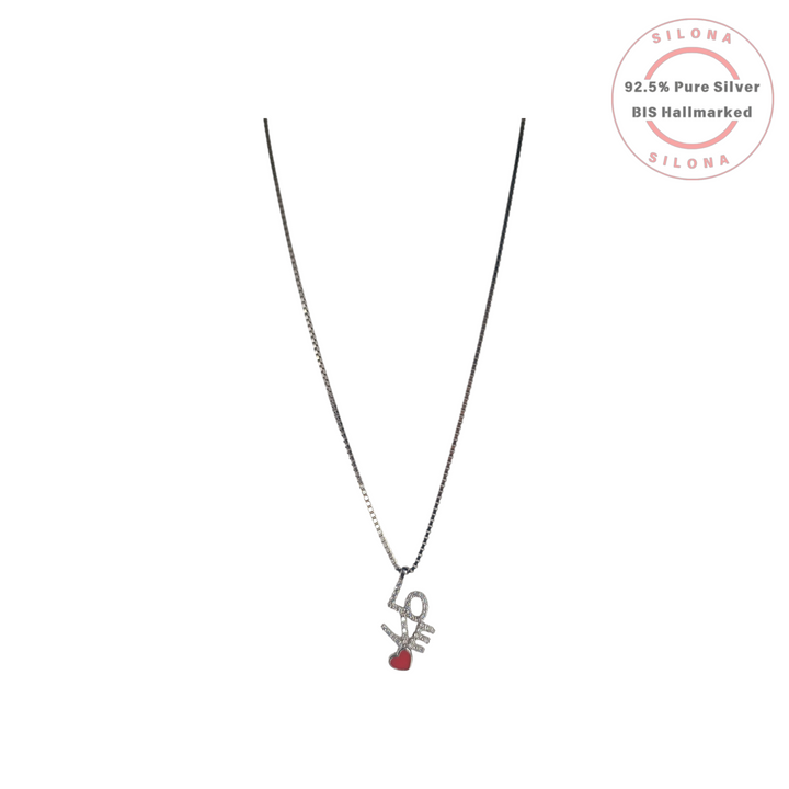 Silona Love motif necklace in 92.5 silver with a pavé cubic zirconia pendant and a red enamel heart, on a delicate box chain.