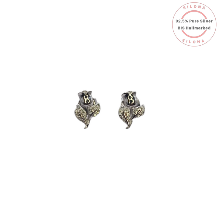 Pair of Silona Vintage Rose Stud Earrings in 92.5 silver, featuring marcasite-encrusted leaves, on a white background.