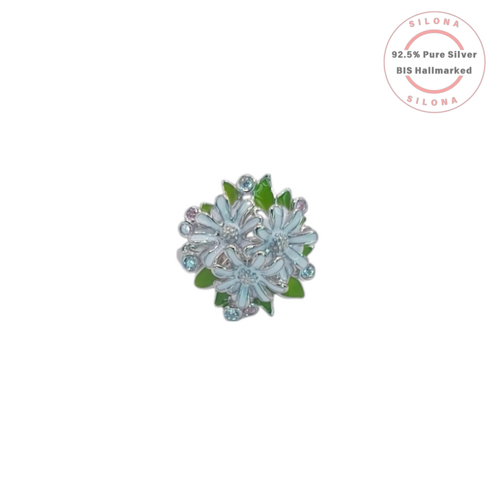 Silona Enchanted Daisy Bouquet Ring, featuring white enamel flowers, green leaves, and pastel cubic zirconia stones, crafted in 92.5 sterling silver.