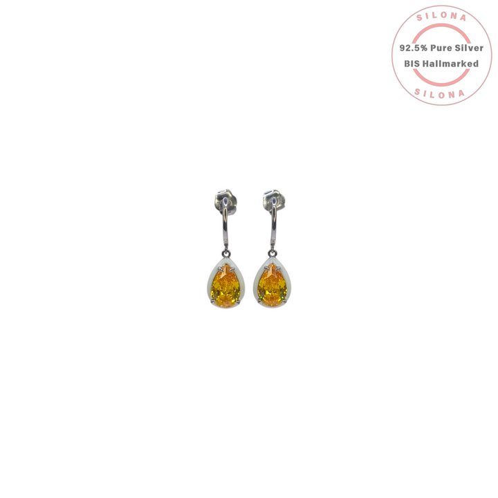 A pair of Silona enamel pear drop earrings in 92.5 silver, featuring a vibrant yellow citrine-hue cubic zirconia stone, on a white background.