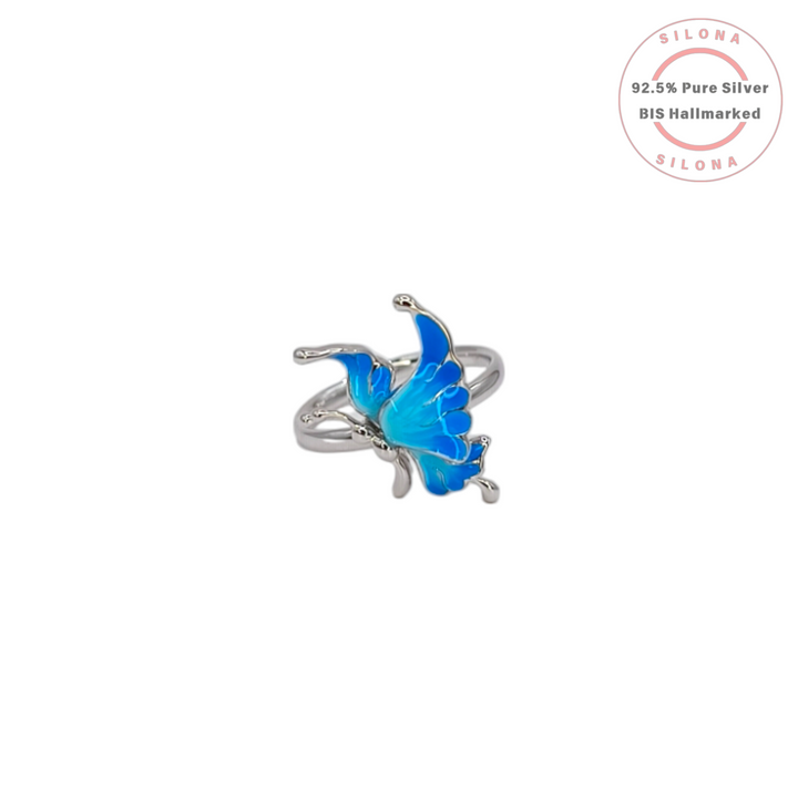 Silona's Enamel Butterfly Ring in pure 92.5 silver, featuring vibrant blue wings on an adjustable band.