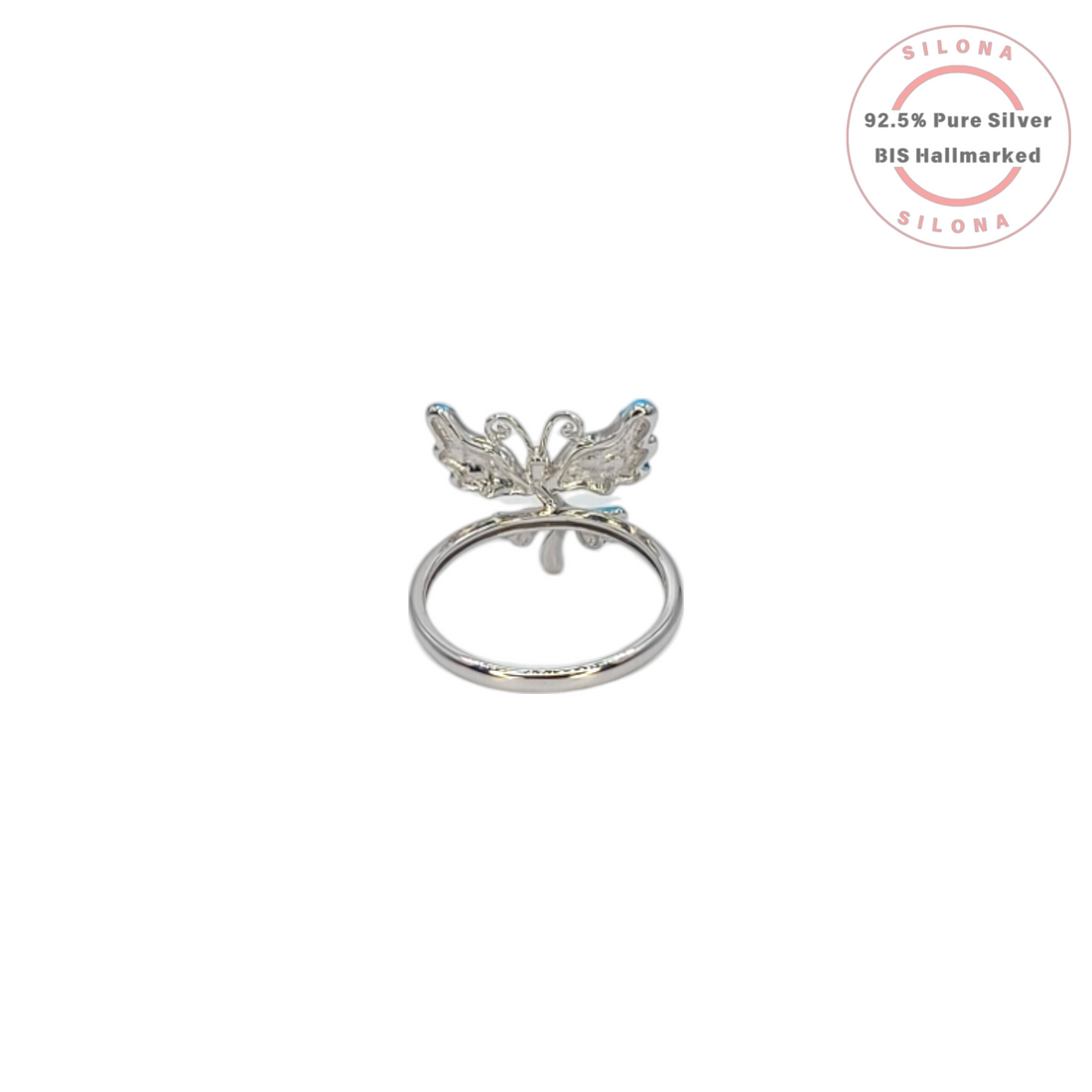 Silona Pastel Bloom Ring in 92.5 silver, featuring a flower design with light blue enamel petals and a central yellow cubic zirconia stone, on a white background.