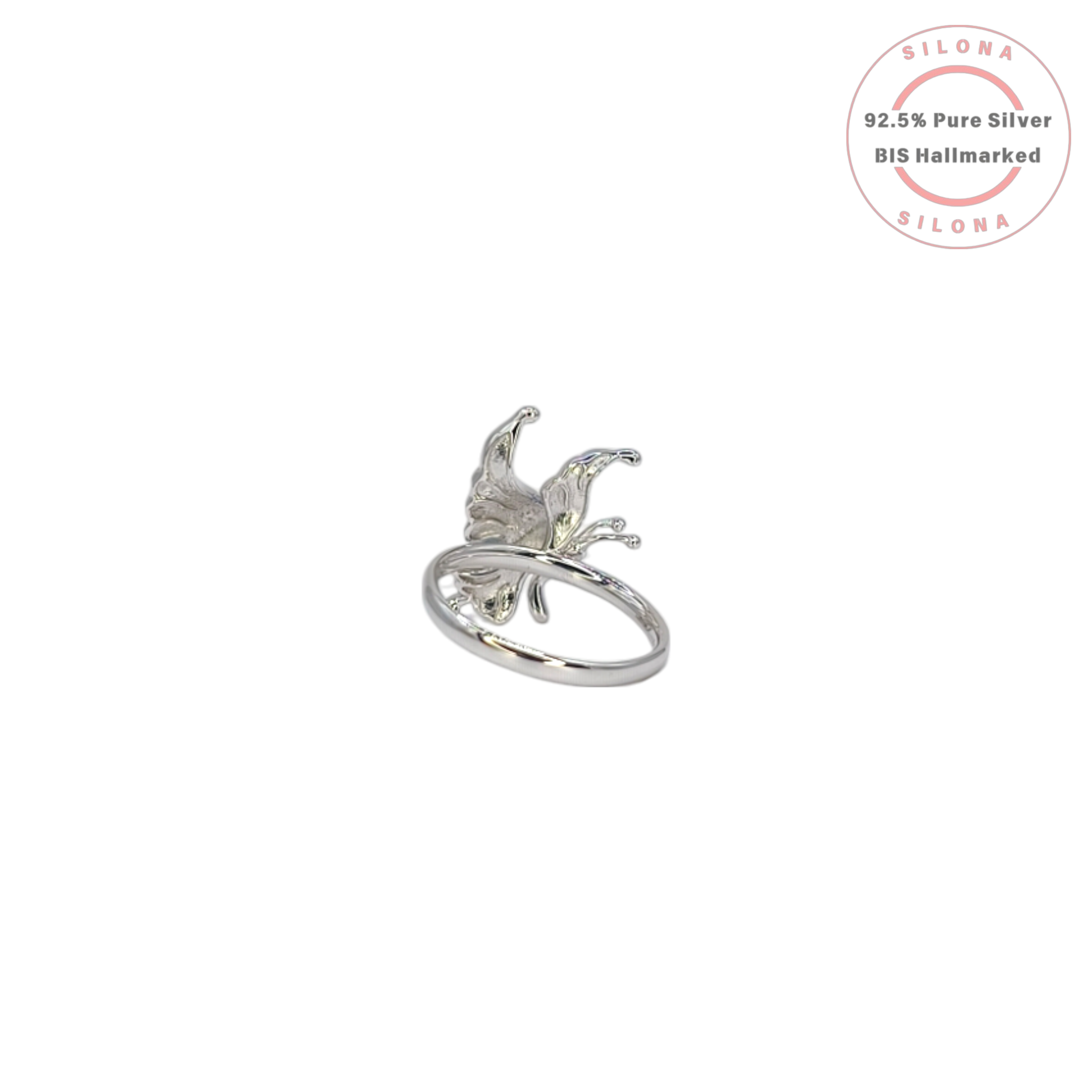 A sculptural sterling silver butterfly ring with a high-shine polish, shown from a side angle on a white background.