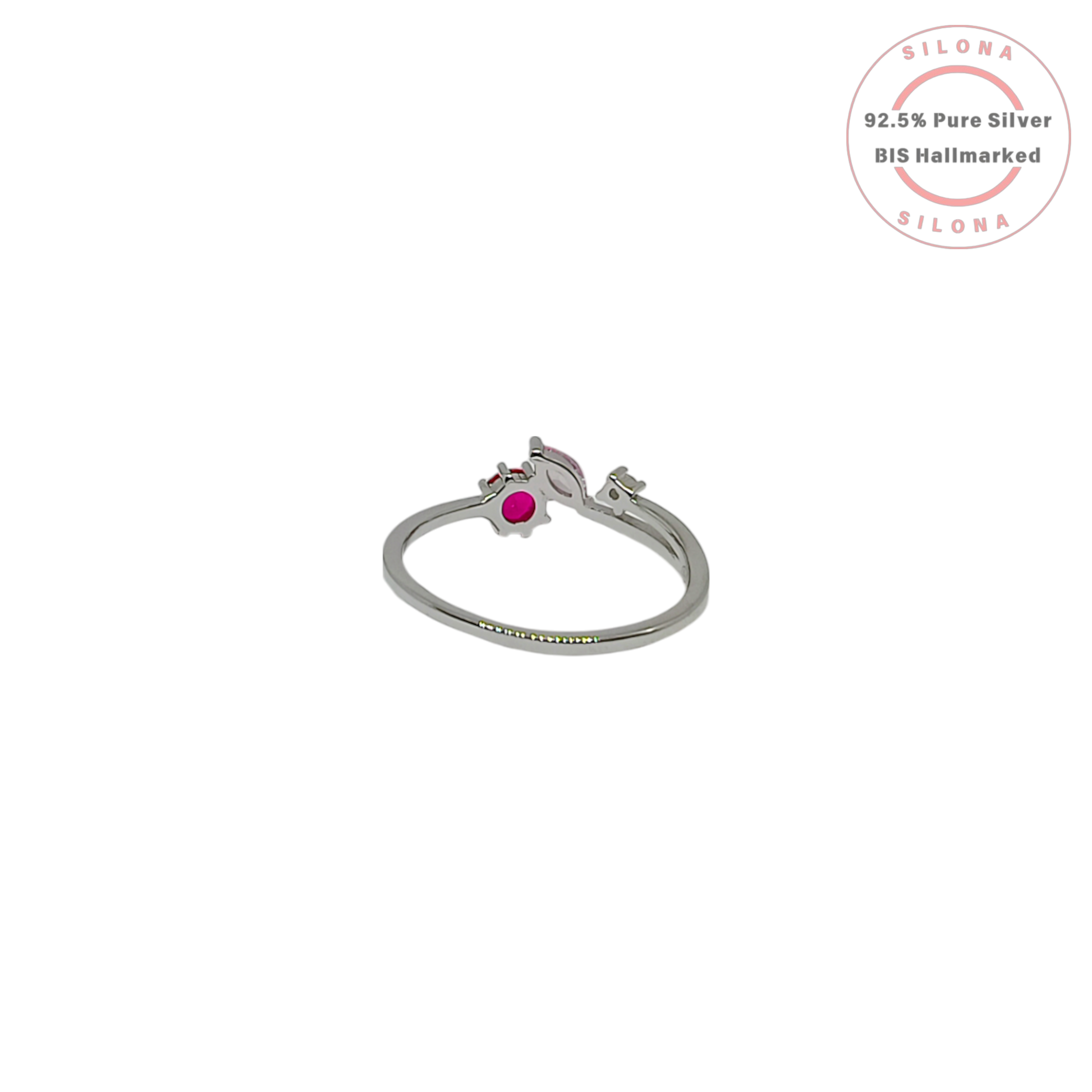 Silona's Floral Cluster Ring in 92.5 silver, featuring a round ruby-hued stone, a marquise pink stone, and a clear accent stone on a split shank band.