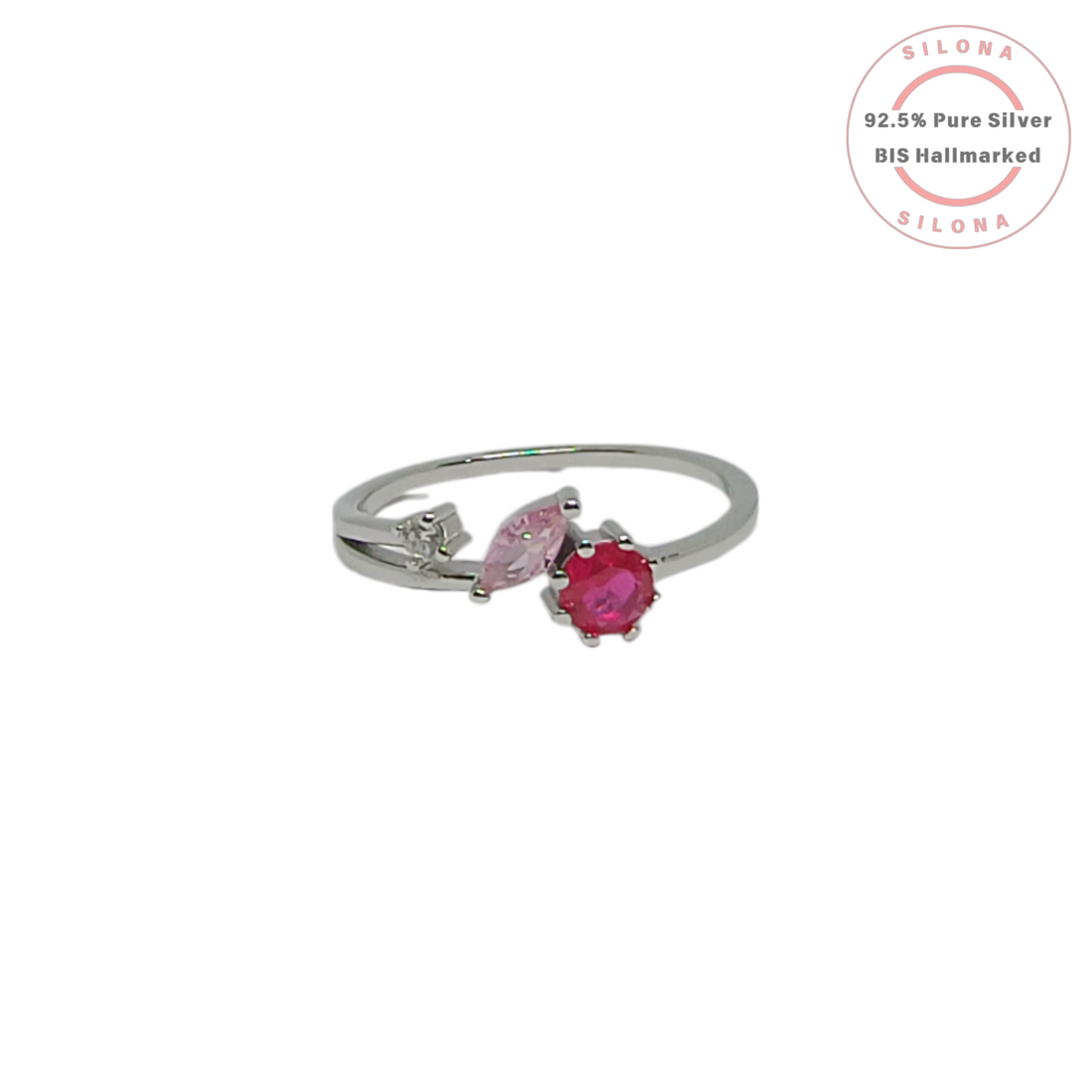 Silona's Floral Cluster Ring in 92.5 silver, featuring a round ruby-hued stone, a marquise pink stone, and a clear accent stone on a split shank band.