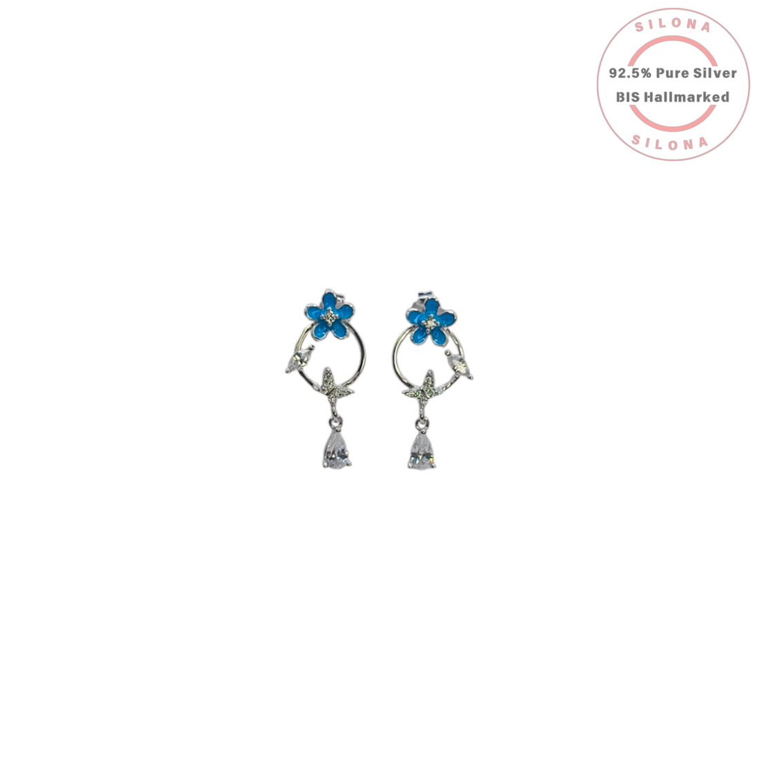 A pair of Silona's Enamel Blue Flower Drop Earrings in 92.5 silver, featuring a blue enamel flower, crystal vine, and a dangling pear-shaped cubic zirconia stone on a white background.