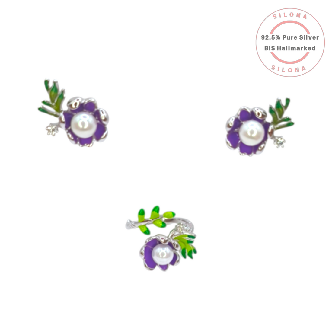 A pair of silver stud earrings shaped like purple enamel flowers with a central pearl, green enamel leaves, and a small cubic zirconia accent, on a white background.