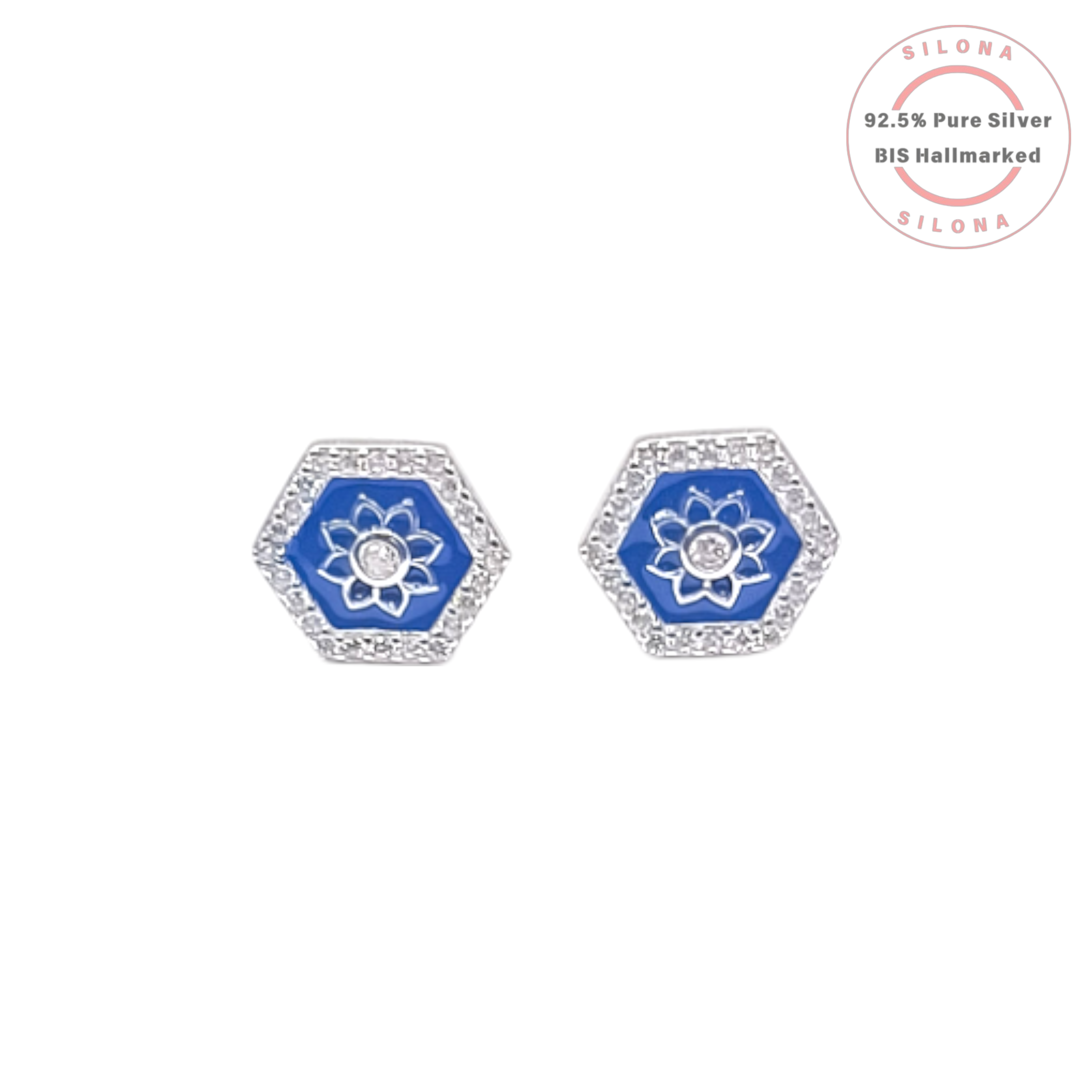 Pair of hexagonal silver stud earrings featuring a floral motif on lapis-blue enamel, framed by a halo of cubic zirconia stones.