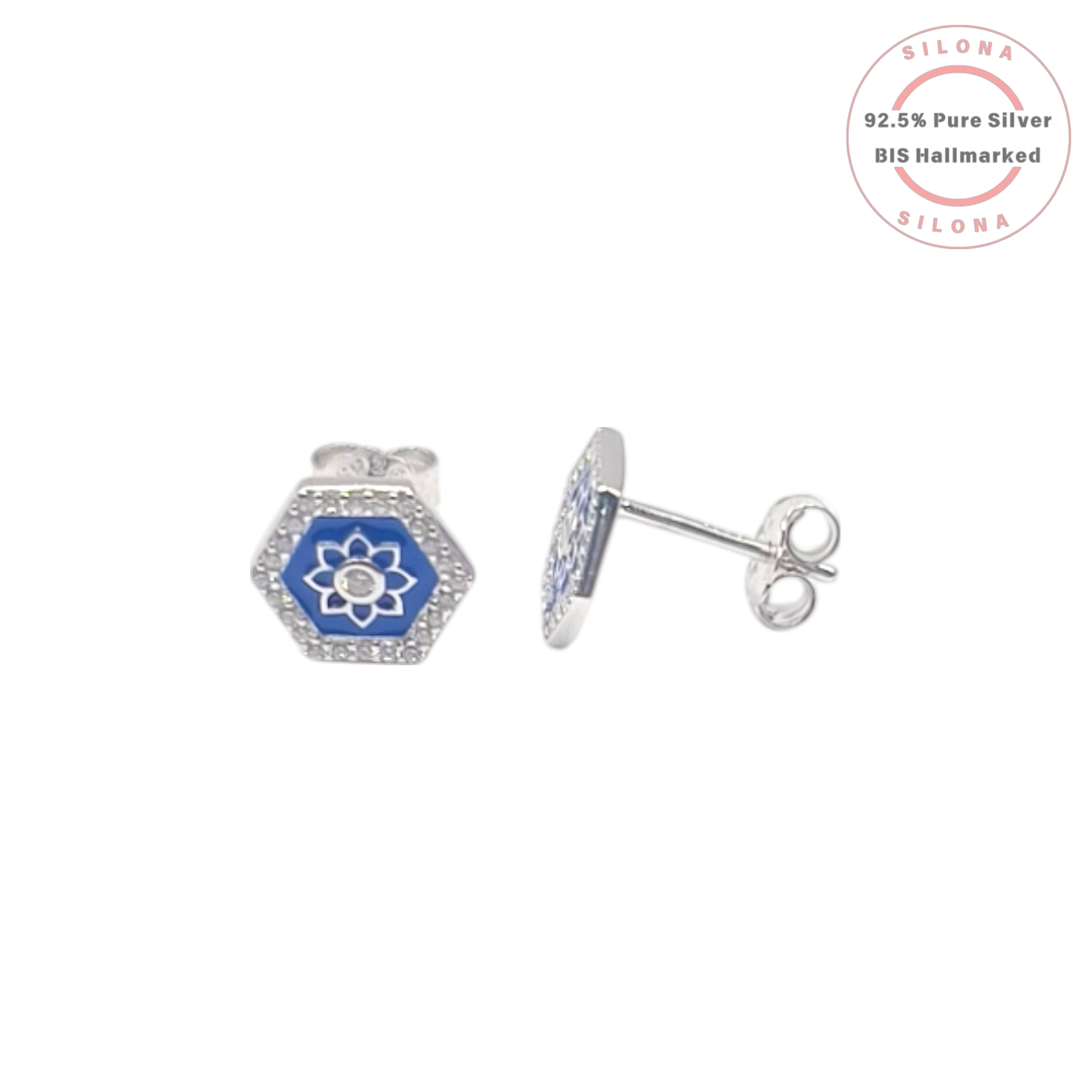 Pair of hexagonal silver stud earrings featuring a floral motif on lapis-blue enamel, framed by a halo of cubic zirconia stones.