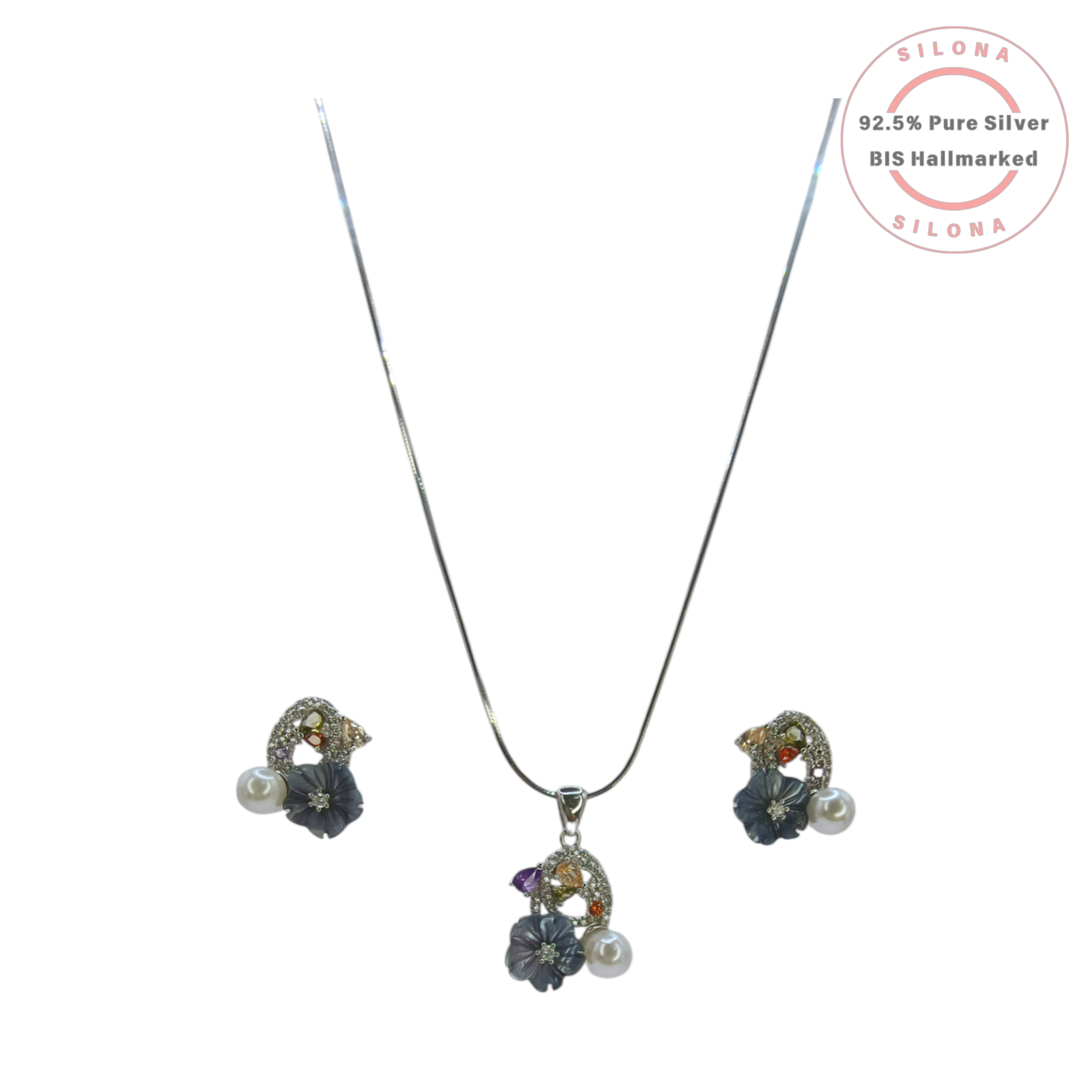 Silona Couture Floral Necklace Set in 92.5 silver, featuring a pavé charm with multi-color stones, a carved grey-blue flower, and a white pearl on a silver chain.