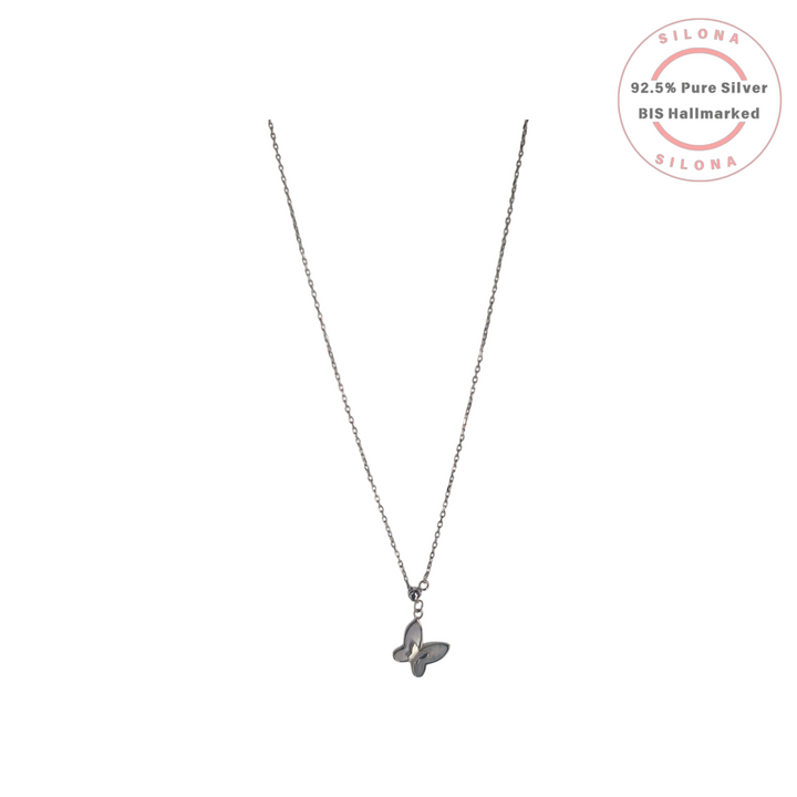 Dainty Mother of Pearl Butterfly Pendant Necklace in 92.5 Sterling Silver on a white background.